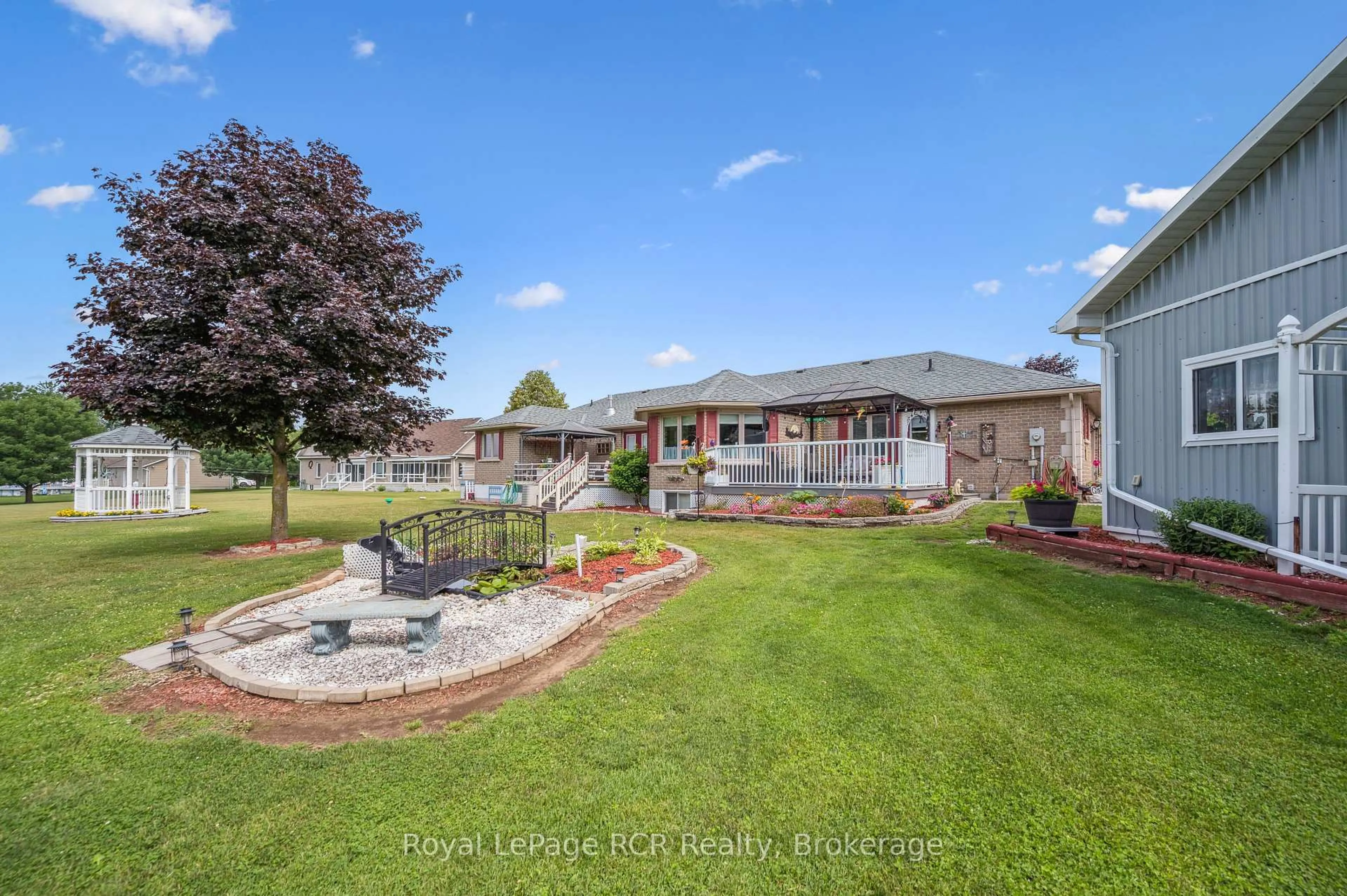 A pic from outside/outdoor area/front of a property/back of a property/a pic from drone, water/lake/river/ocean view for 2 Murray Way, Minto Ontario N0G 2L0