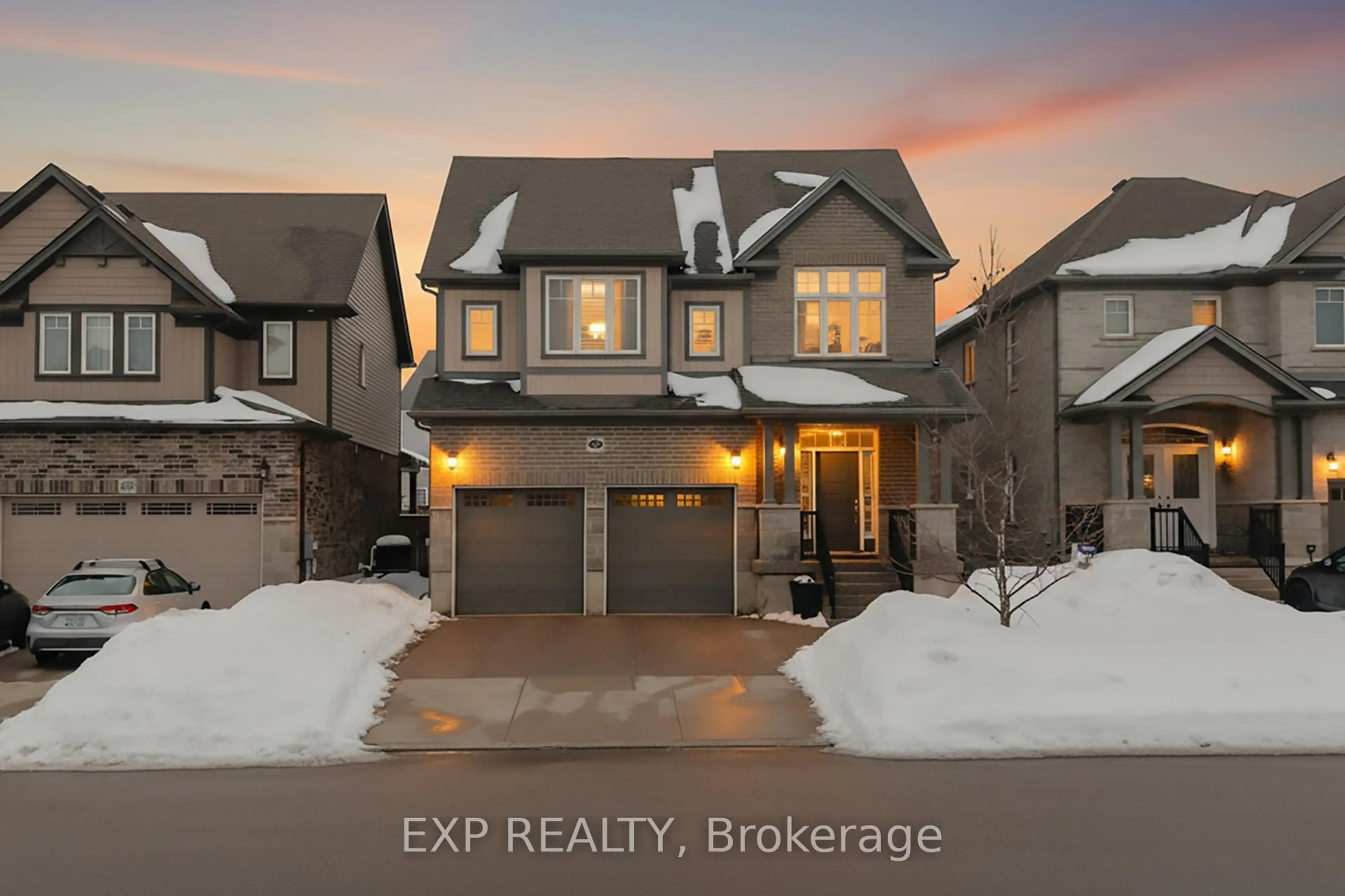 A pic from outside/outdoor area/front of a property/back of a property/a pic from drone, street for 297 Thomas Slee Dr, Kitchener Ontario N2P 0B7