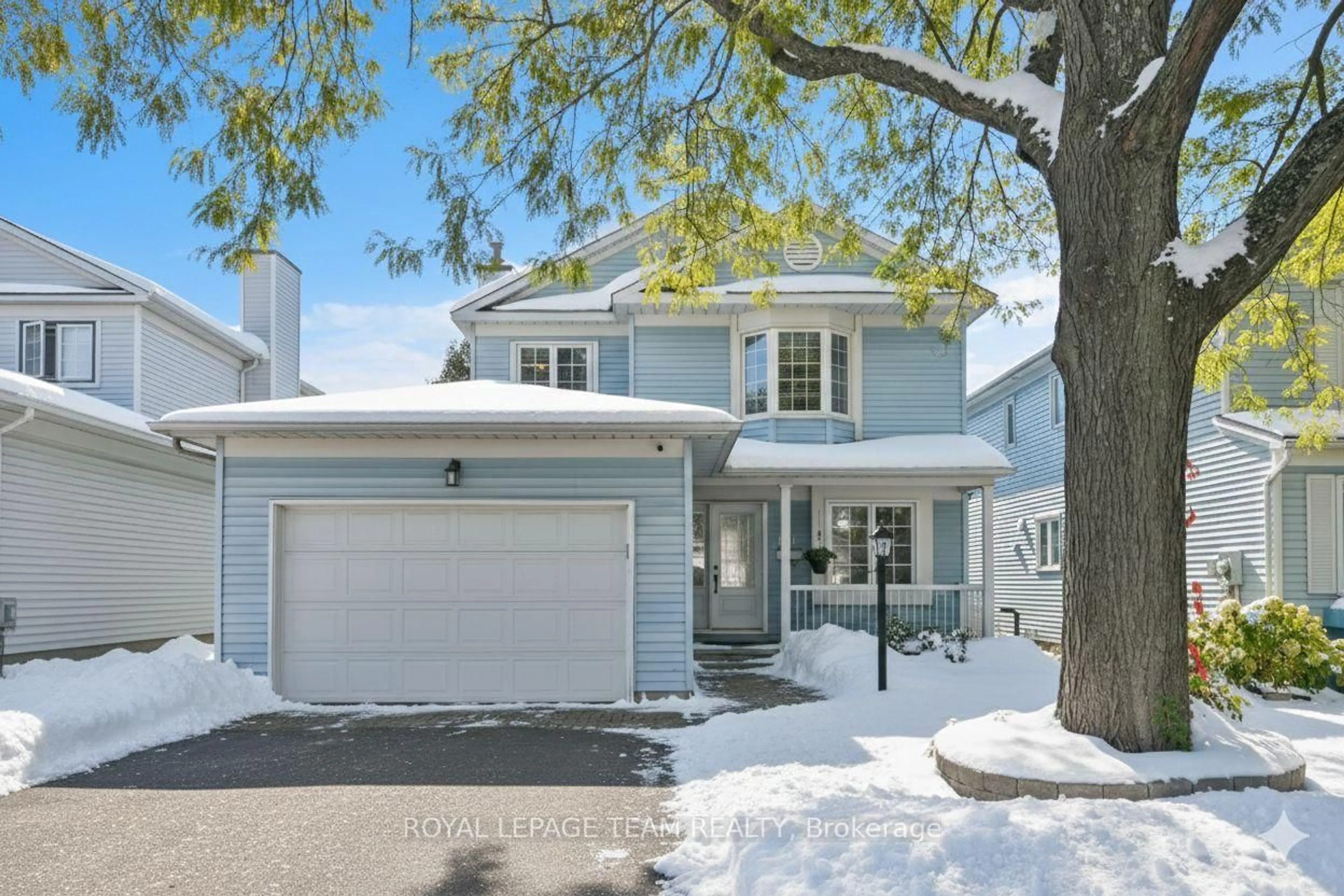 Home with vinyl exterior material, street for 310 Mceachern Cres, Orleans Ontario K1E 3K2