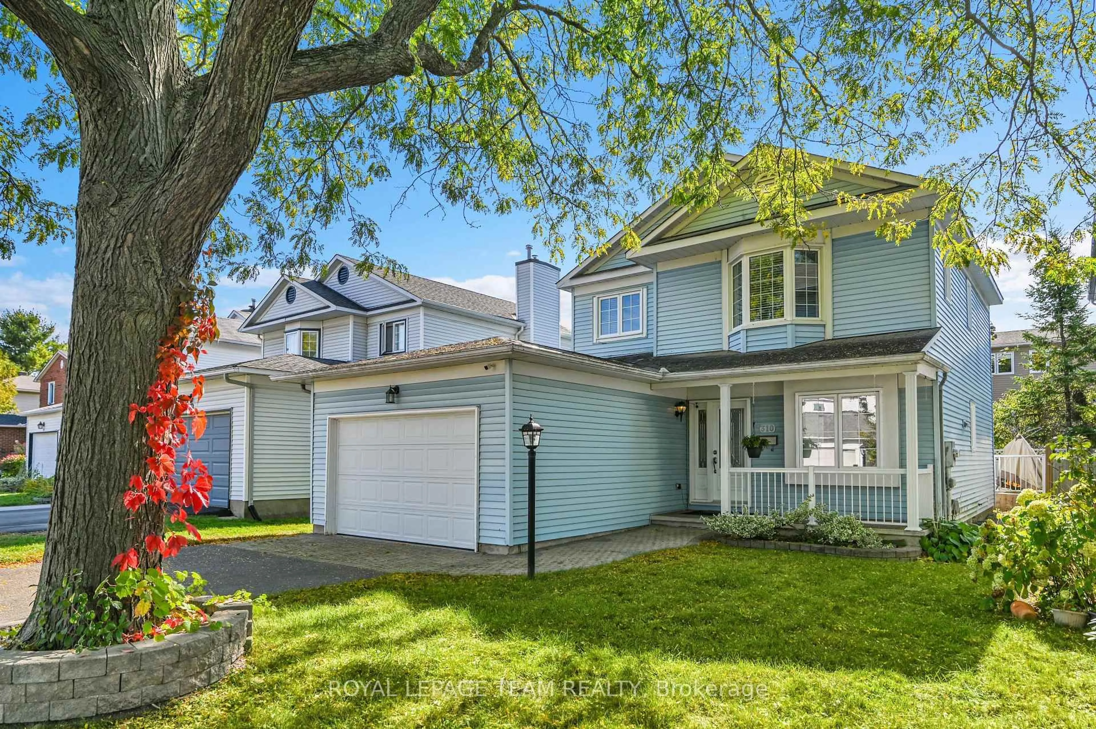 Home with vinyl exterior material, street for 310 Mceachern Cres, Orleans Ontario K1E 3K2