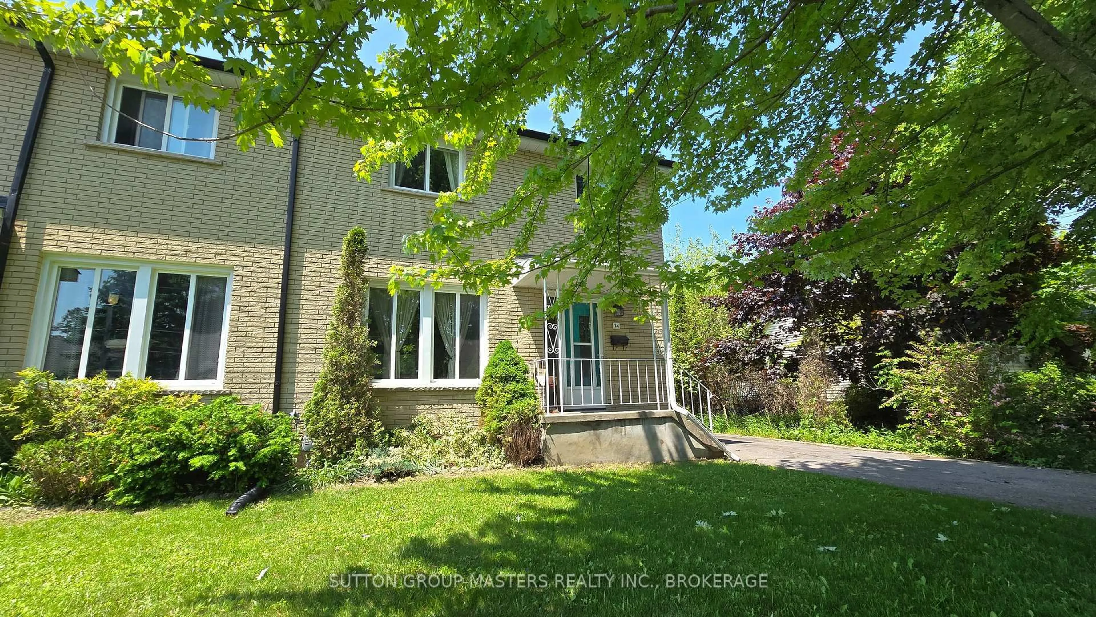 A pic from outside/outdoor area/front of a property/back of a property/a pic from drone, street for 7A Bishop St, Kingston Ontario K7M 3P5