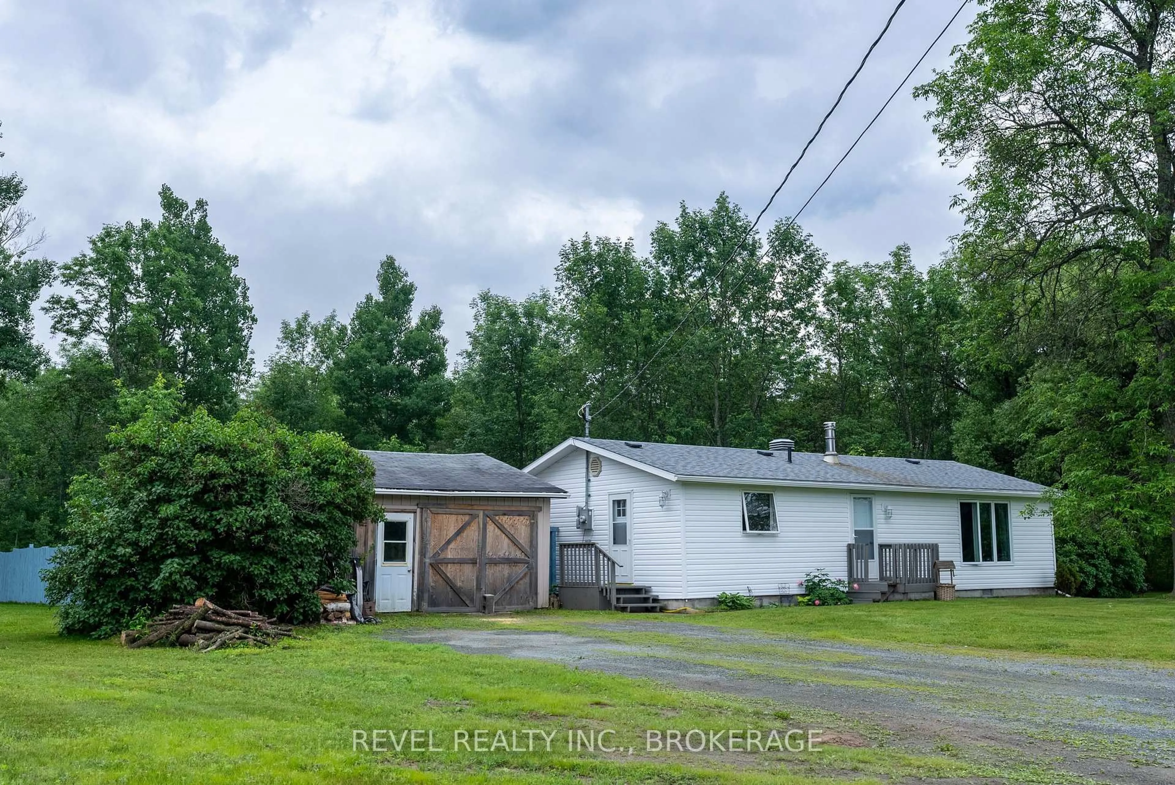 A pic from outside/outdoor area/front of a property/back of a property/a pic from drone, street for 62 Highway 17 Highway, Spanish Ontario P0P 2A0