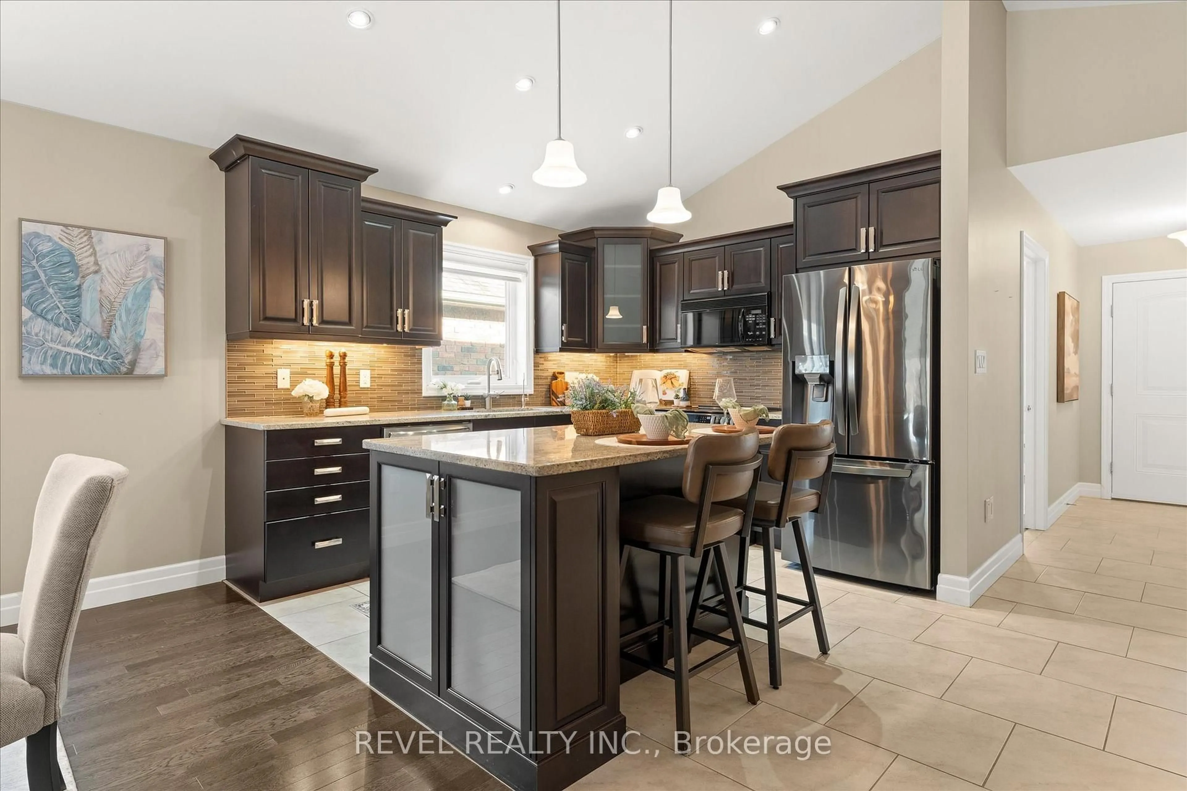 Open concept kitchen, ceramic/tile floor for 1060 Gabrieau St, LaSalle Ontario N9H 1H5