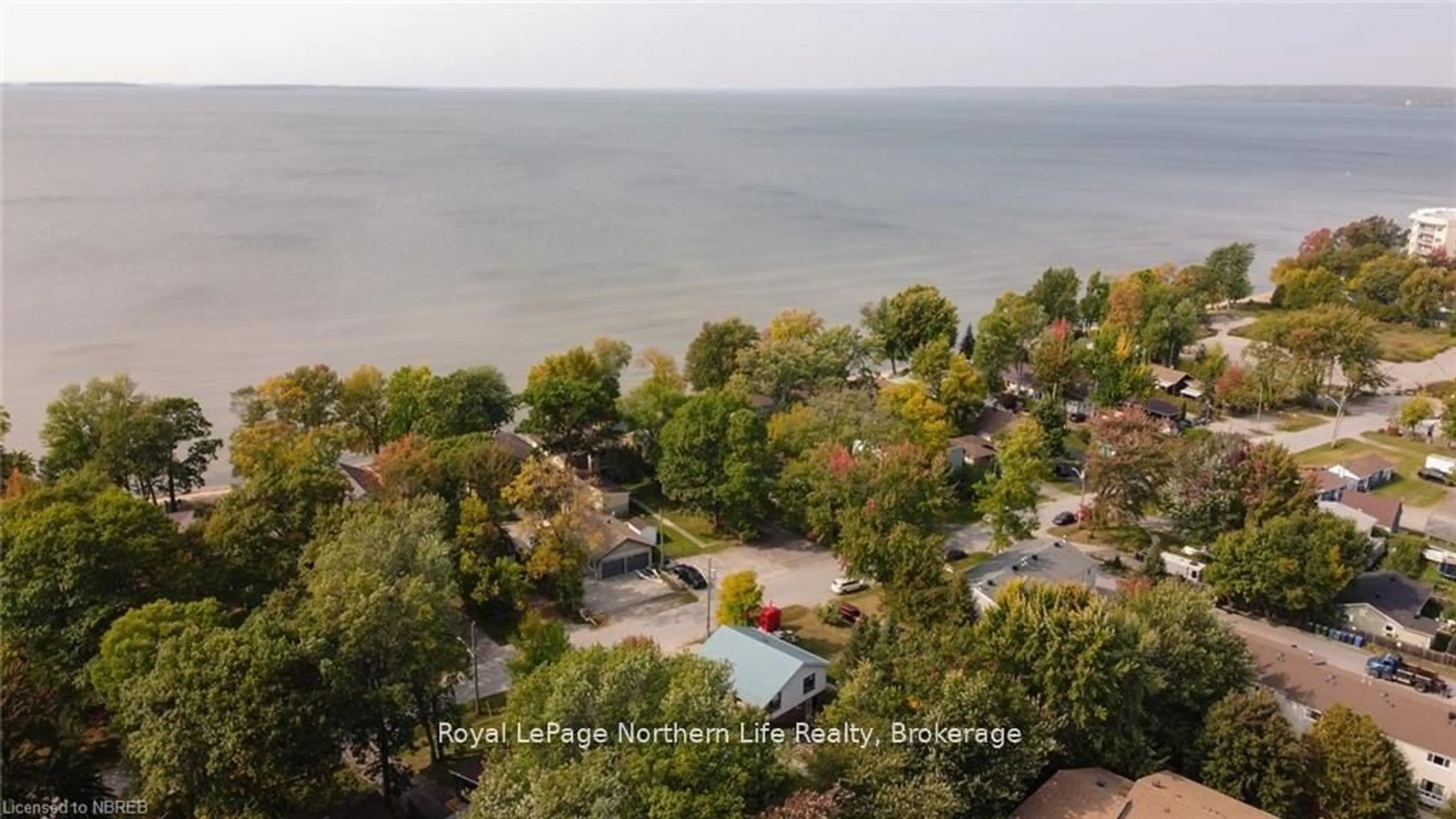 A pic from outside/outdoor area/front of a property/back of a property/a pic from drone, water/lake/river/ocean view for 581 Banner Ave, North Bay Ontario P1A 1X7