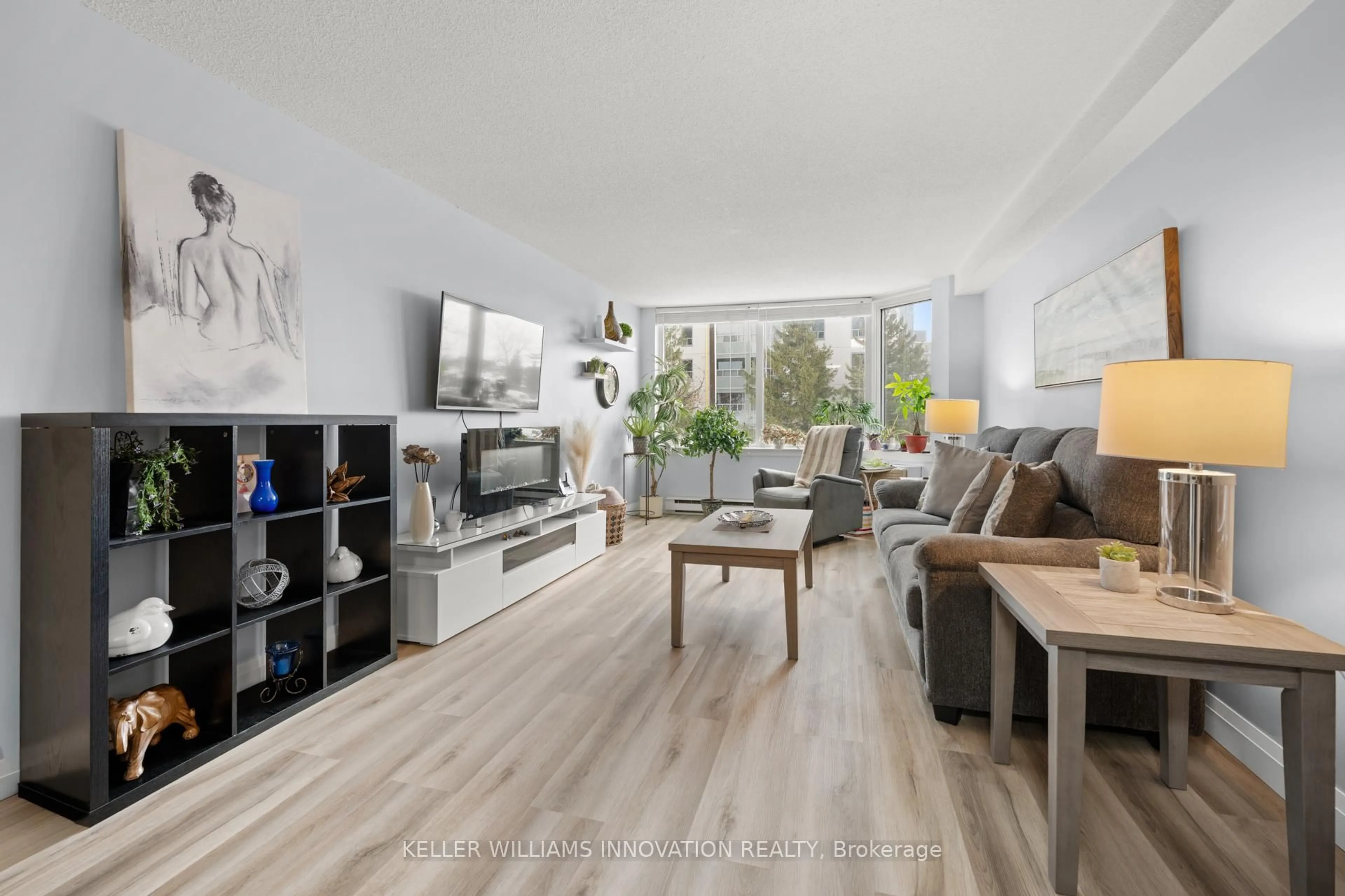 Living room with furniture, unknown for 35 Green Valley Dr #204, Waterloo Ontario N2P 2A5