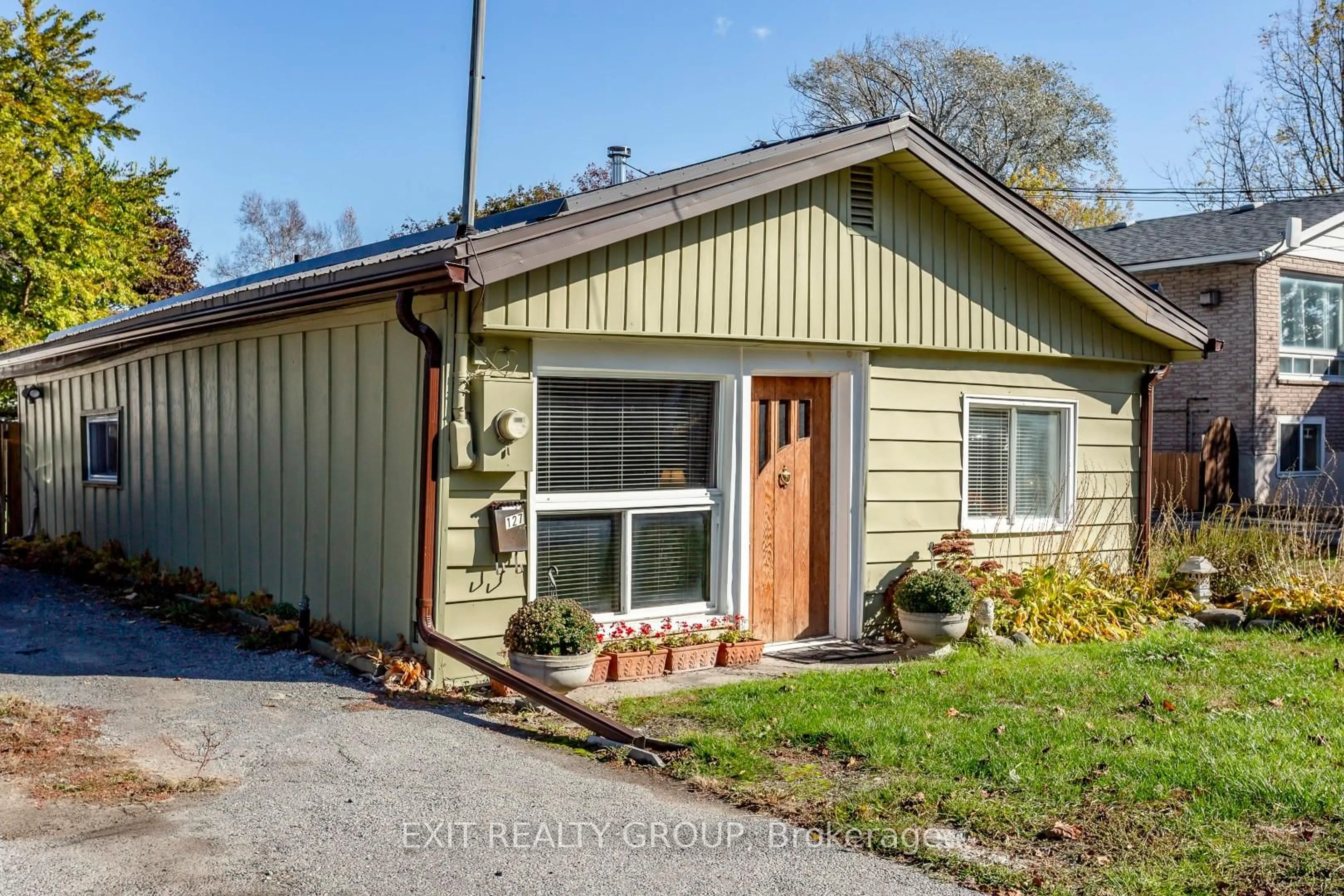 Home with vinyl exterior material, street for 127 Leopold St, Quinte West Ontario K8V 2K5