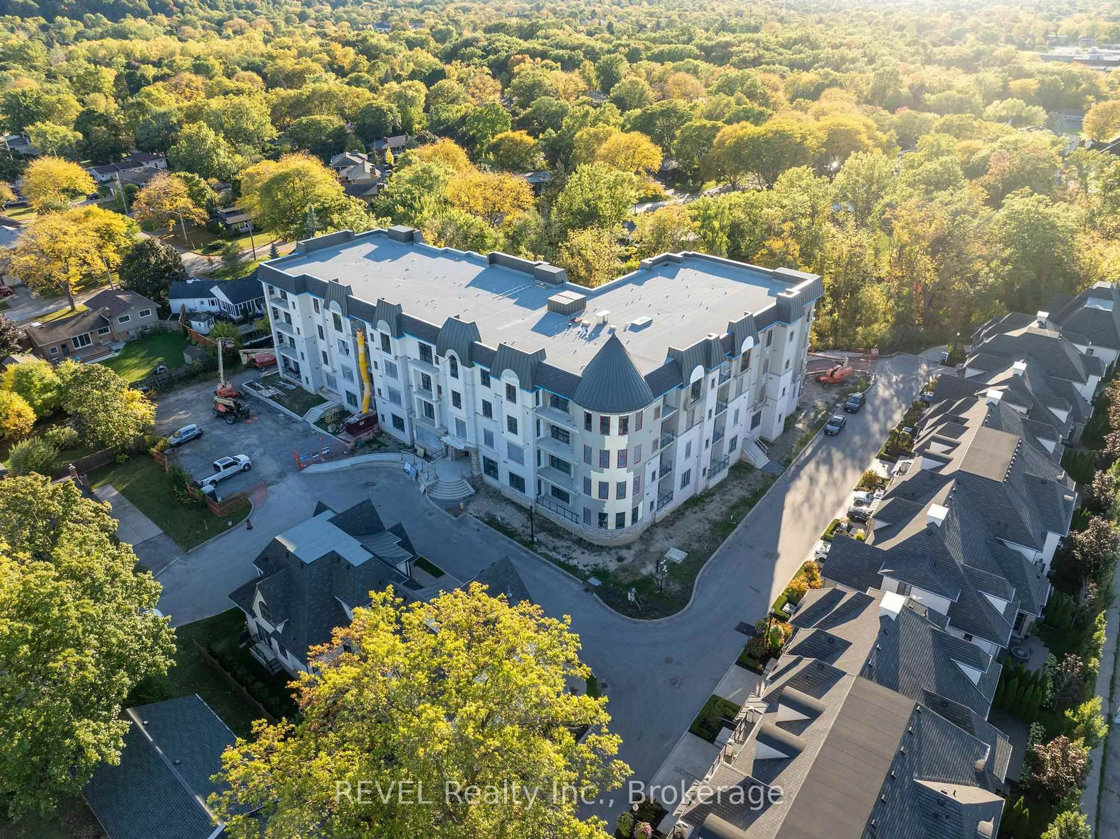 A pic from outside/outdoor area/front of a property/back of a property/a pic from drone, unknown for 2 Arbourvale Common #410, St. Catharines Ontario L2T 2Z9