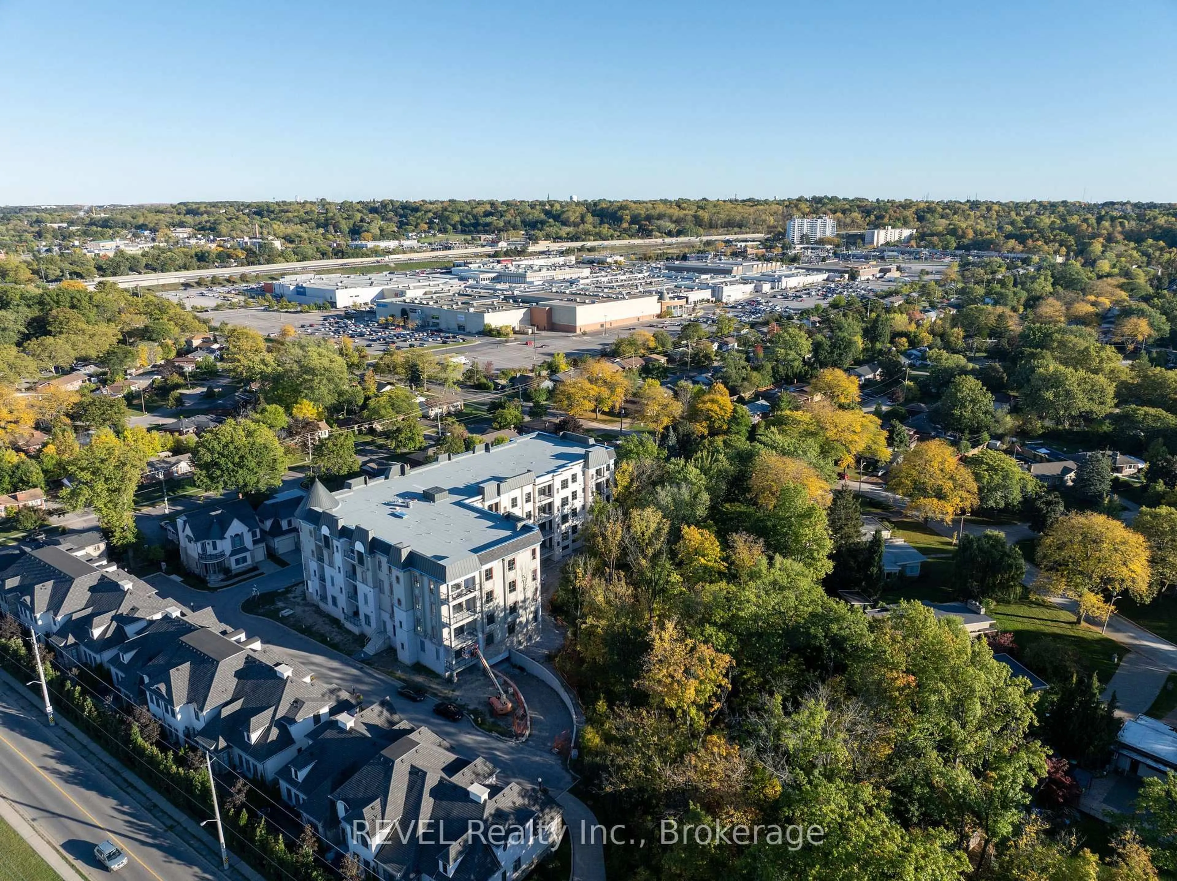 A pic from outside/outdoor area/front of a property/back of a property/a pic from drone, city buildings view from balcony for 2 Arbourvale Common #410, St. Catharines Ontario L2T 2Z9