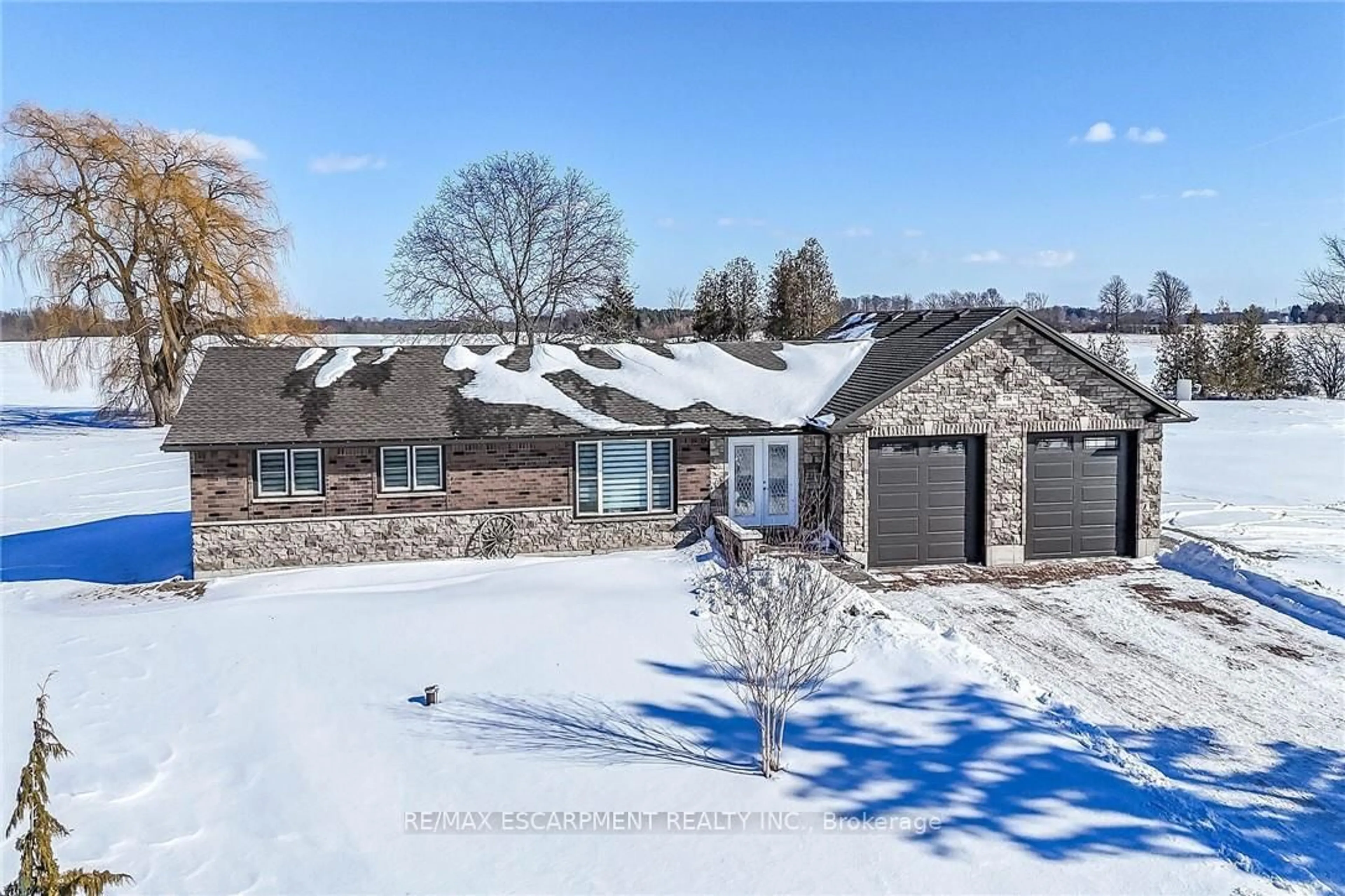 A pic from outside/outdoor area/front of a property/back of a property/a pic from drone, street for 778 Blueline Rd, Norfolk Ontario N0A 1N2