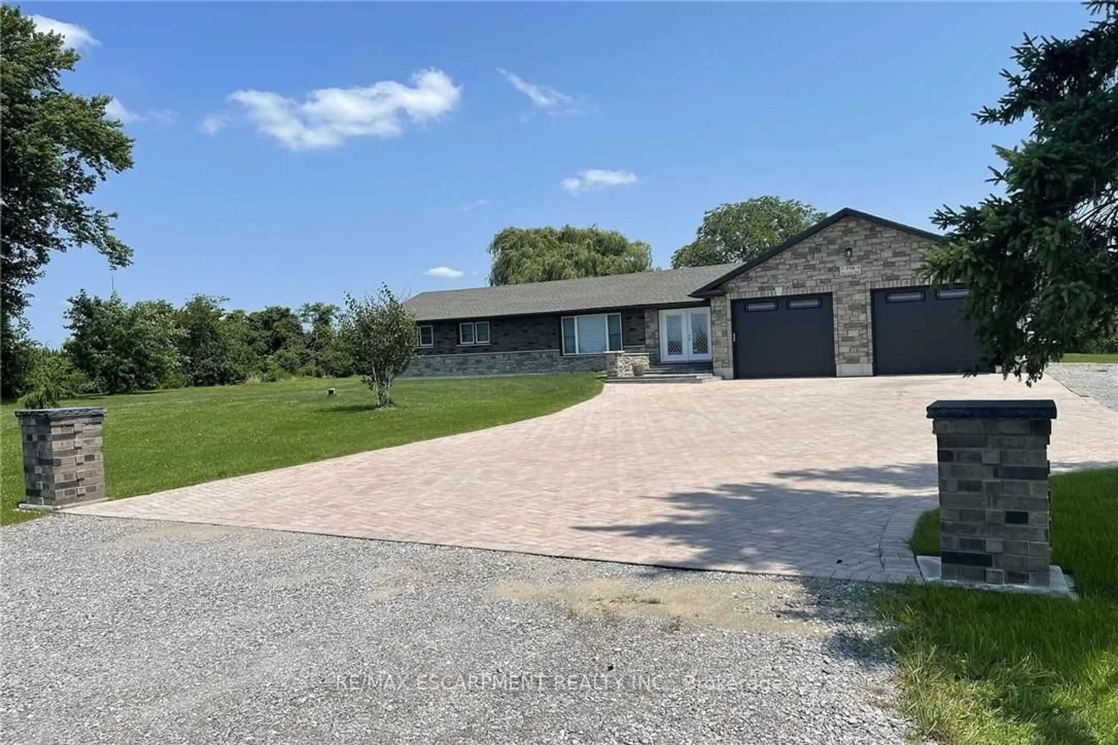 A pic from outside/outdoor area/front of a property/back of a property/a pic from drone, street for 778 Blueline Rd, Norfolk Ontario N0A 1N2
