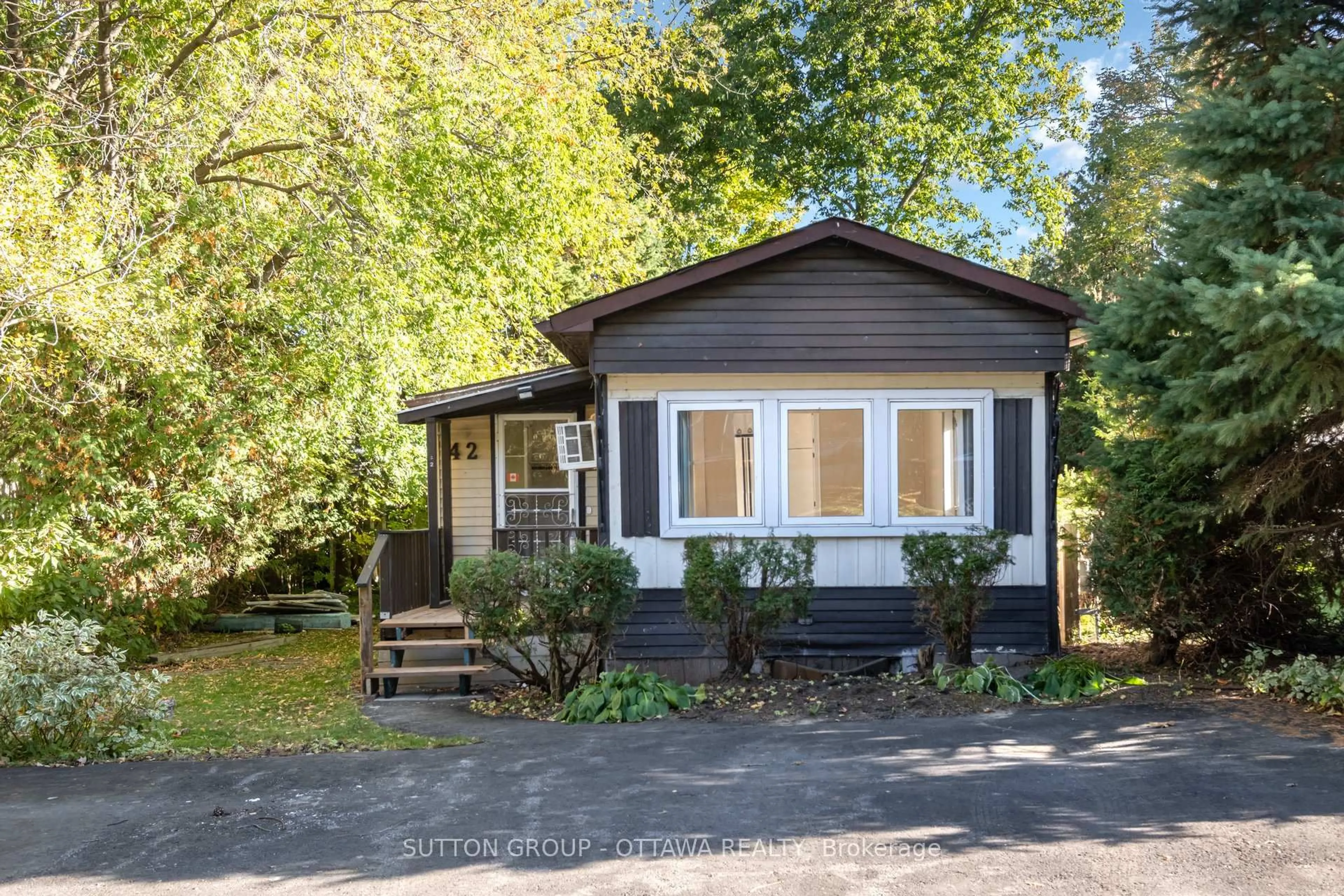 Home with vinyl exterior material, street for 7481 MITCH OWENS Rd #42, Ottawa Ontario K1G 3N4