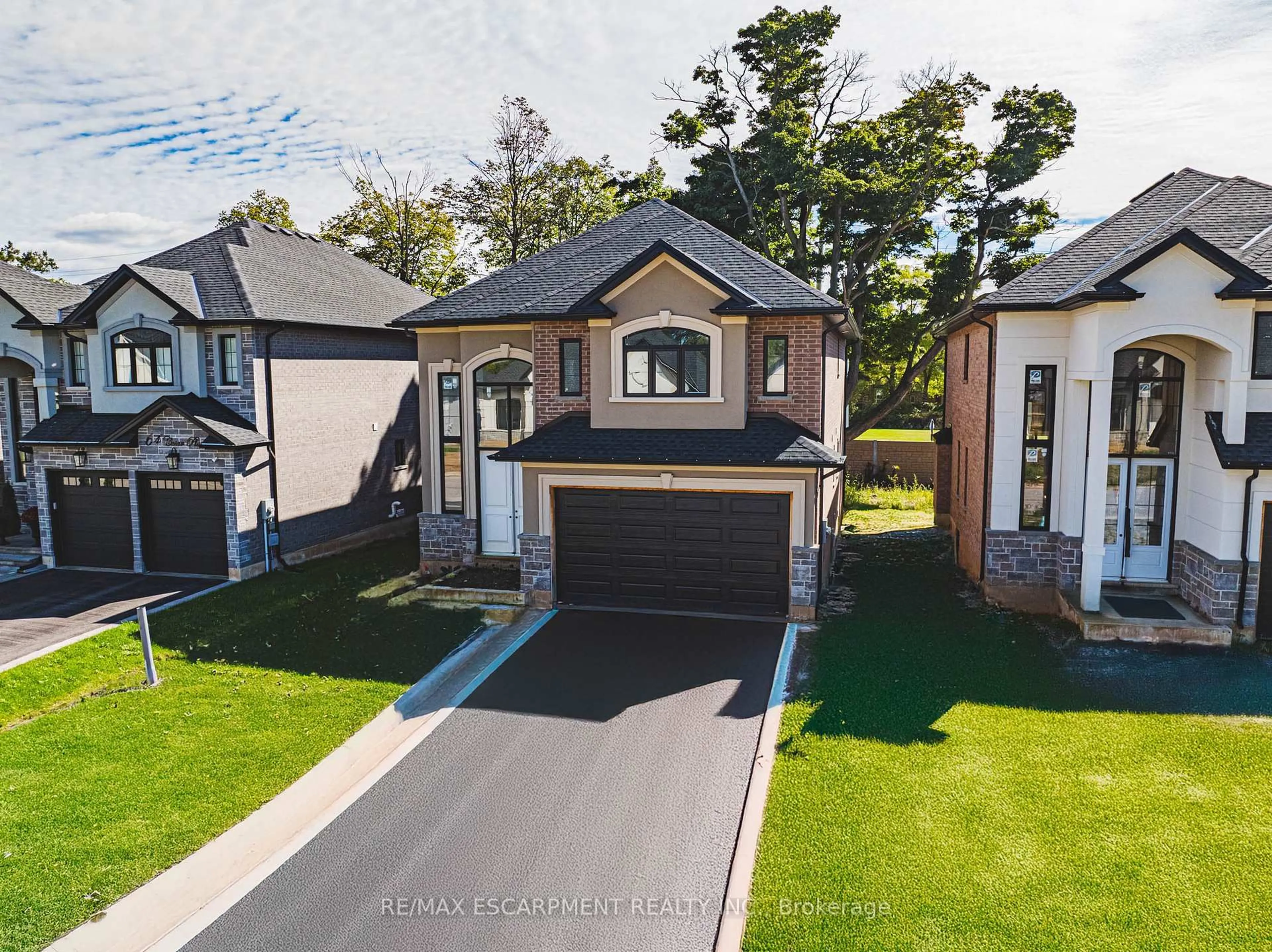 A pic from outside/outdoor area/front of a property/back of a property/a pic from drone, street for 44 Cesar Pl, Hamilton Ontario L9G 0G3