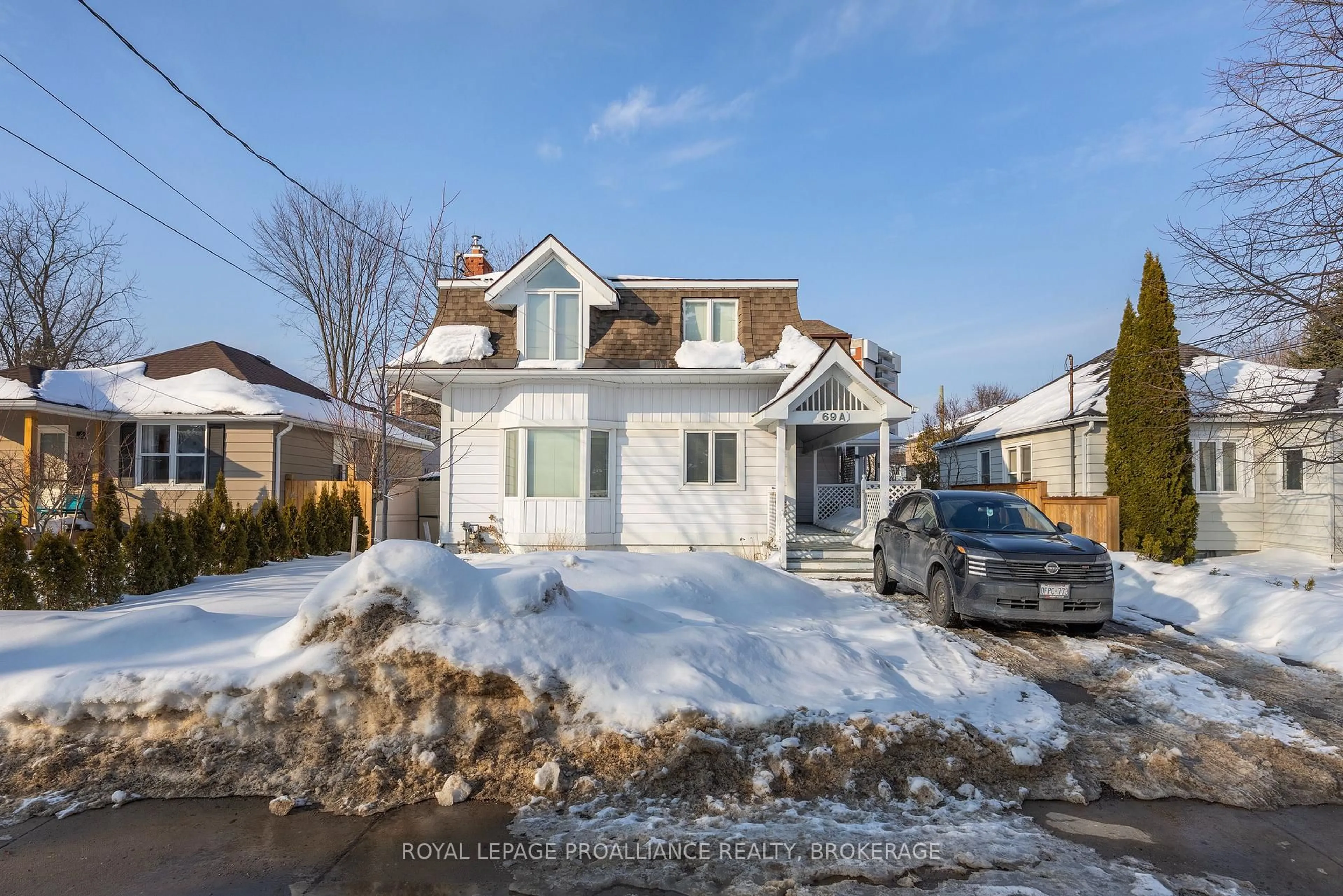 Home with vinyl exterior material, street for 69 Scott St, Kingston Ontario K7L 1L6