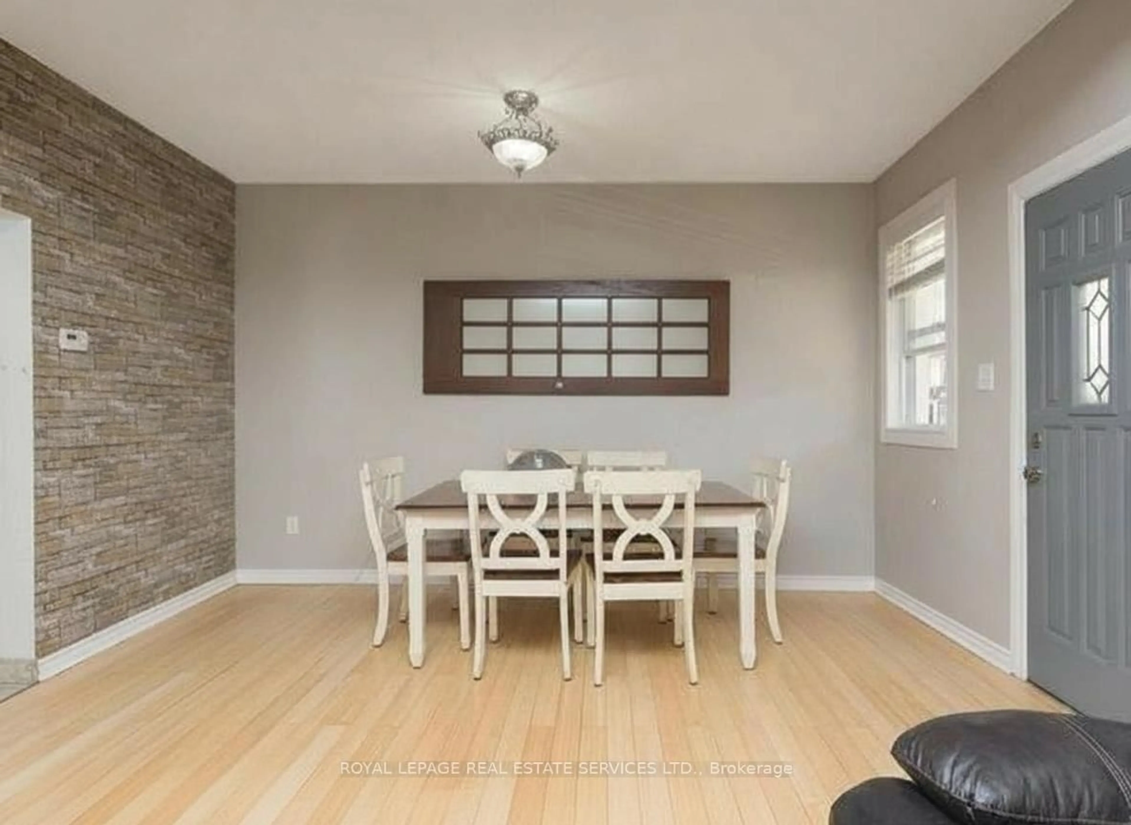 Dining room, wood/laminate floor for 43 Rosemont Ave, Hamilton Ontario L8L 2M4