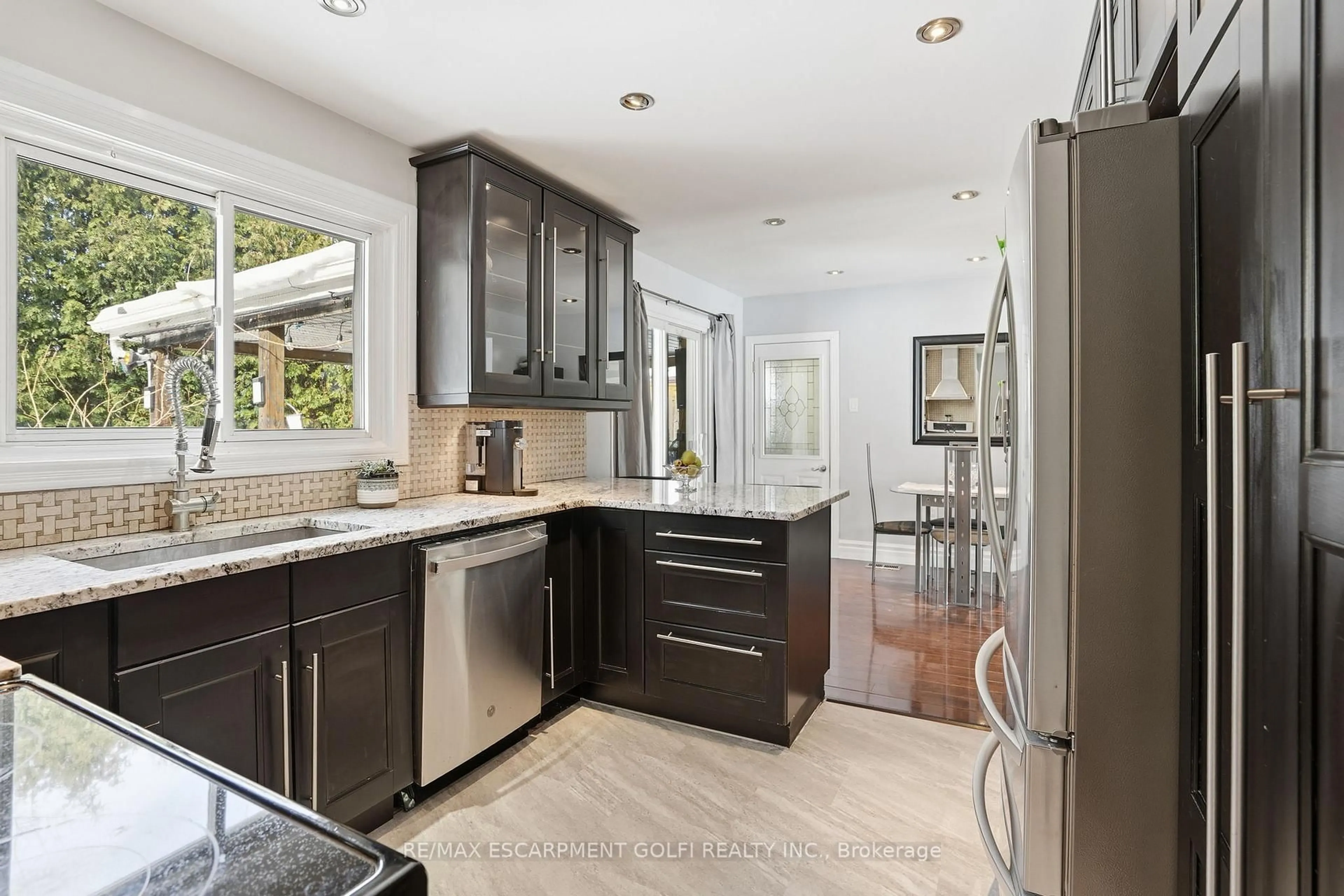 Open concept kitchen, ceramic/tile floor for 7 Piott Crt, Hamilton Ontario L8G 2W2