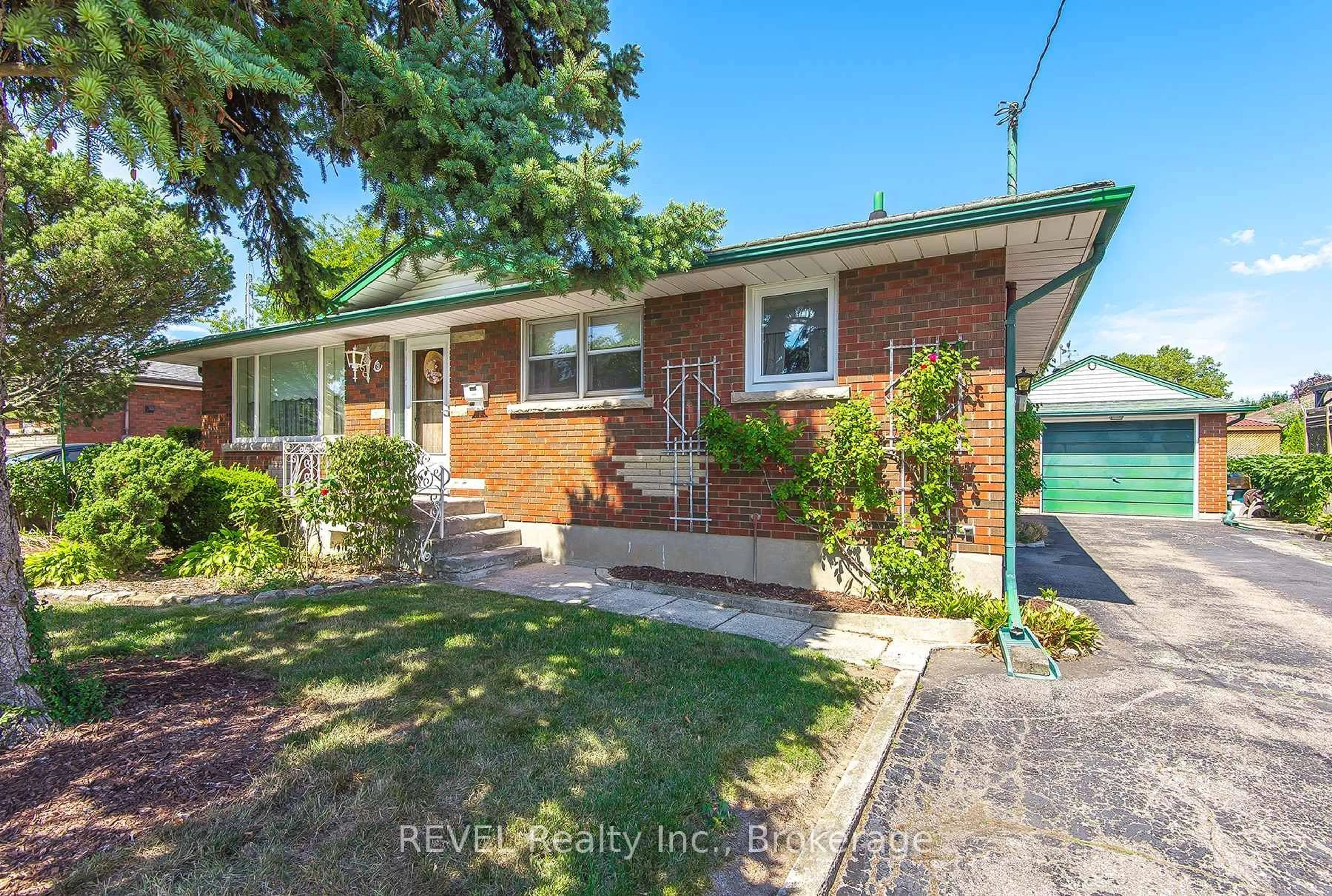 Home with brick exterior material, street for 9 Hawthorne Ave, St. Catharines Ontario L2M 6A8