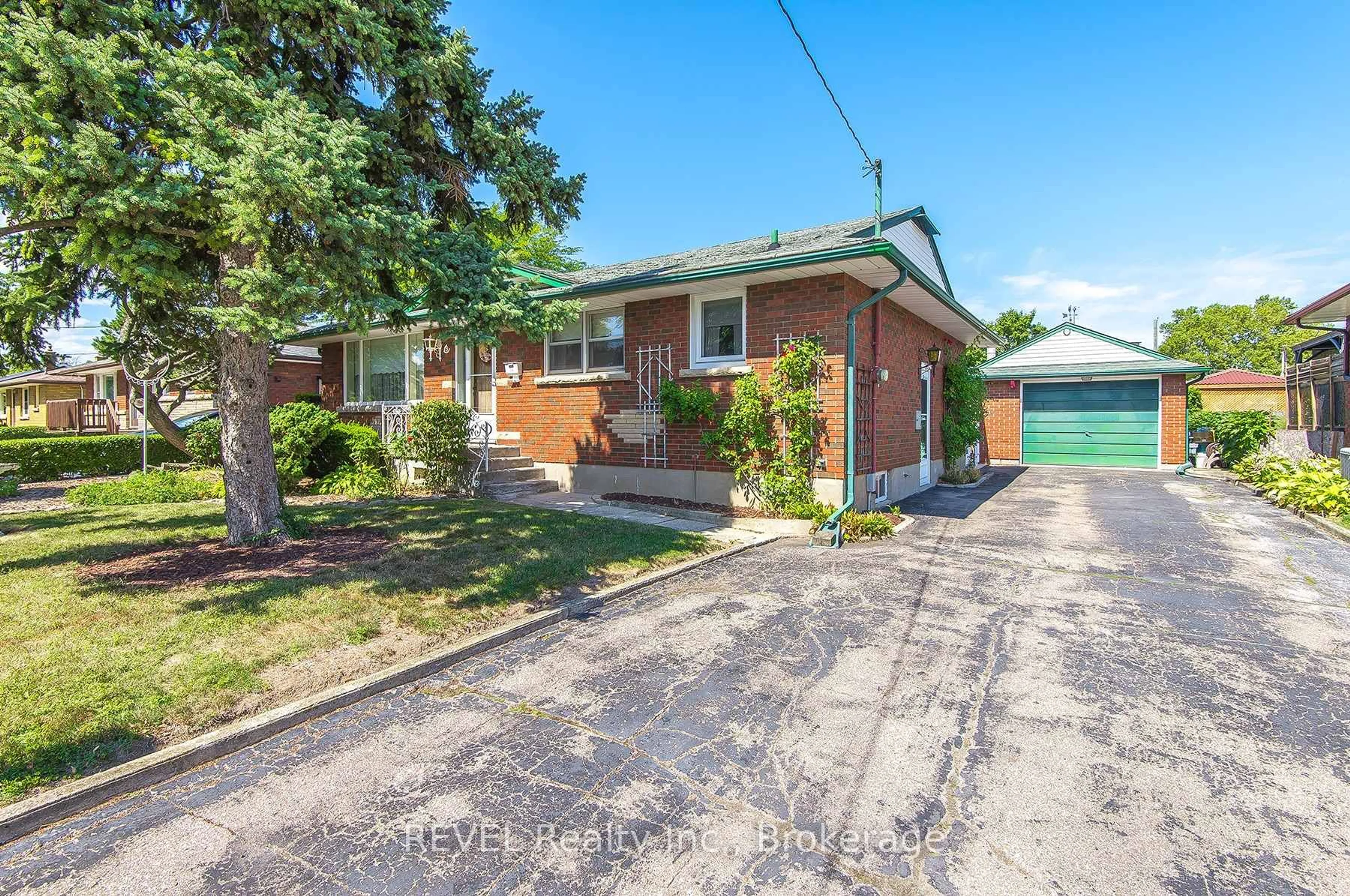 Home with brick exterior material, street for 9 Hawthorne Ave, St. Catharines Ontario L2M 6A8