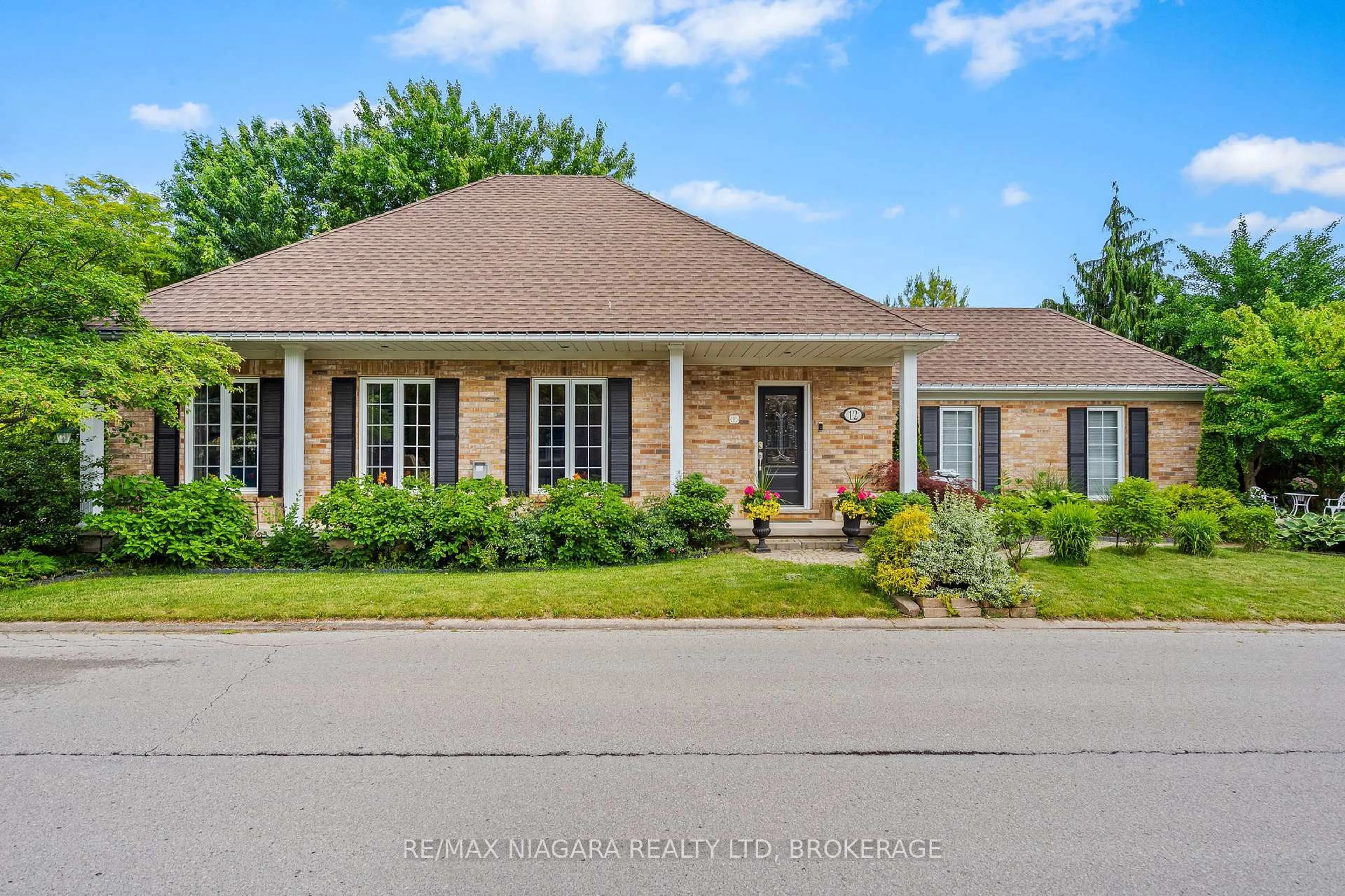 Home with brick exterior material, street for 12 Pinot Tr, Niagara-on-the-Lake Ontario L0S 1J0