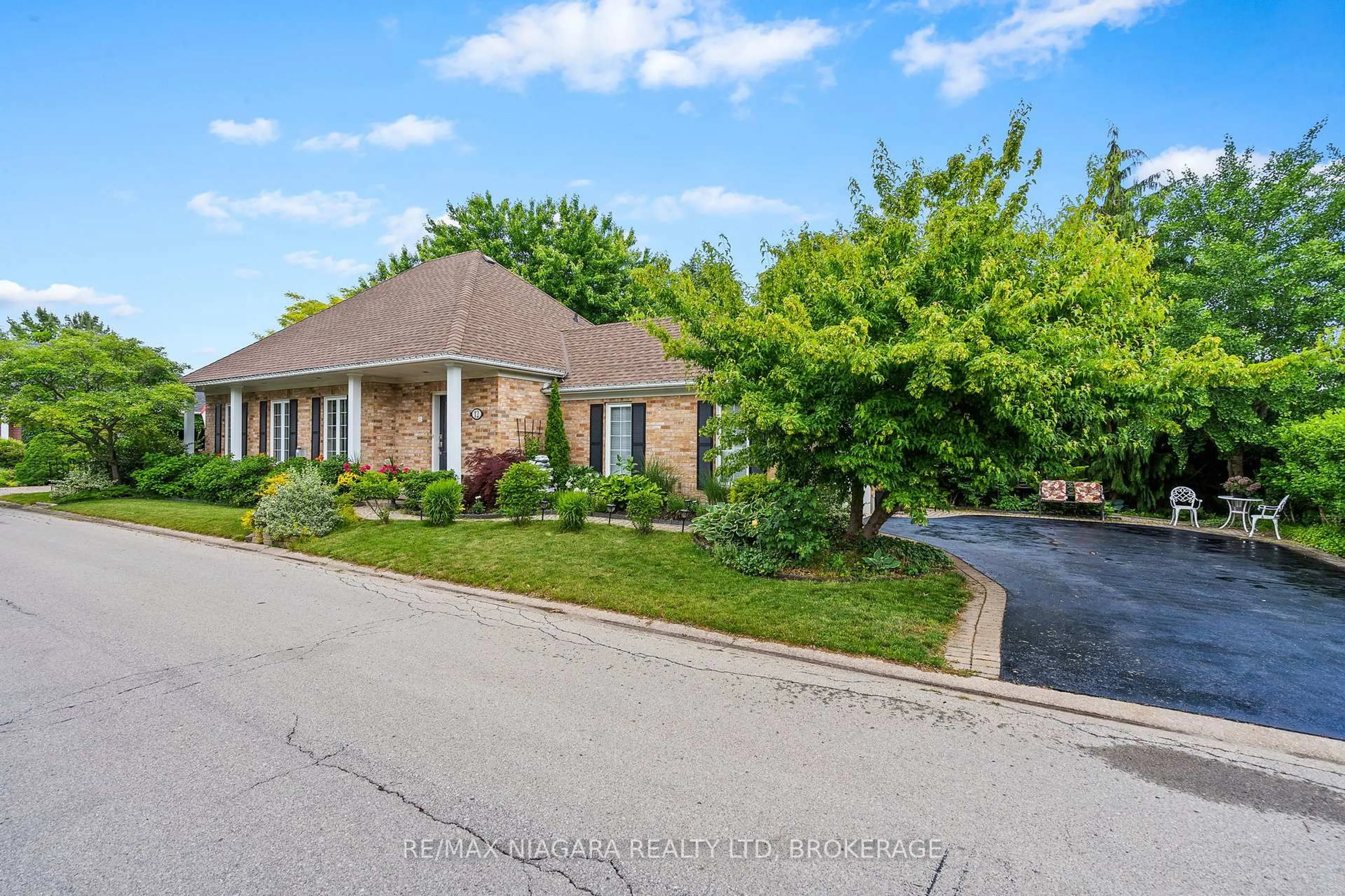 Home with brick exterior material, street for 12 Pinot Tr, Niagara-on-the-Lake Ontario L0S 1J0