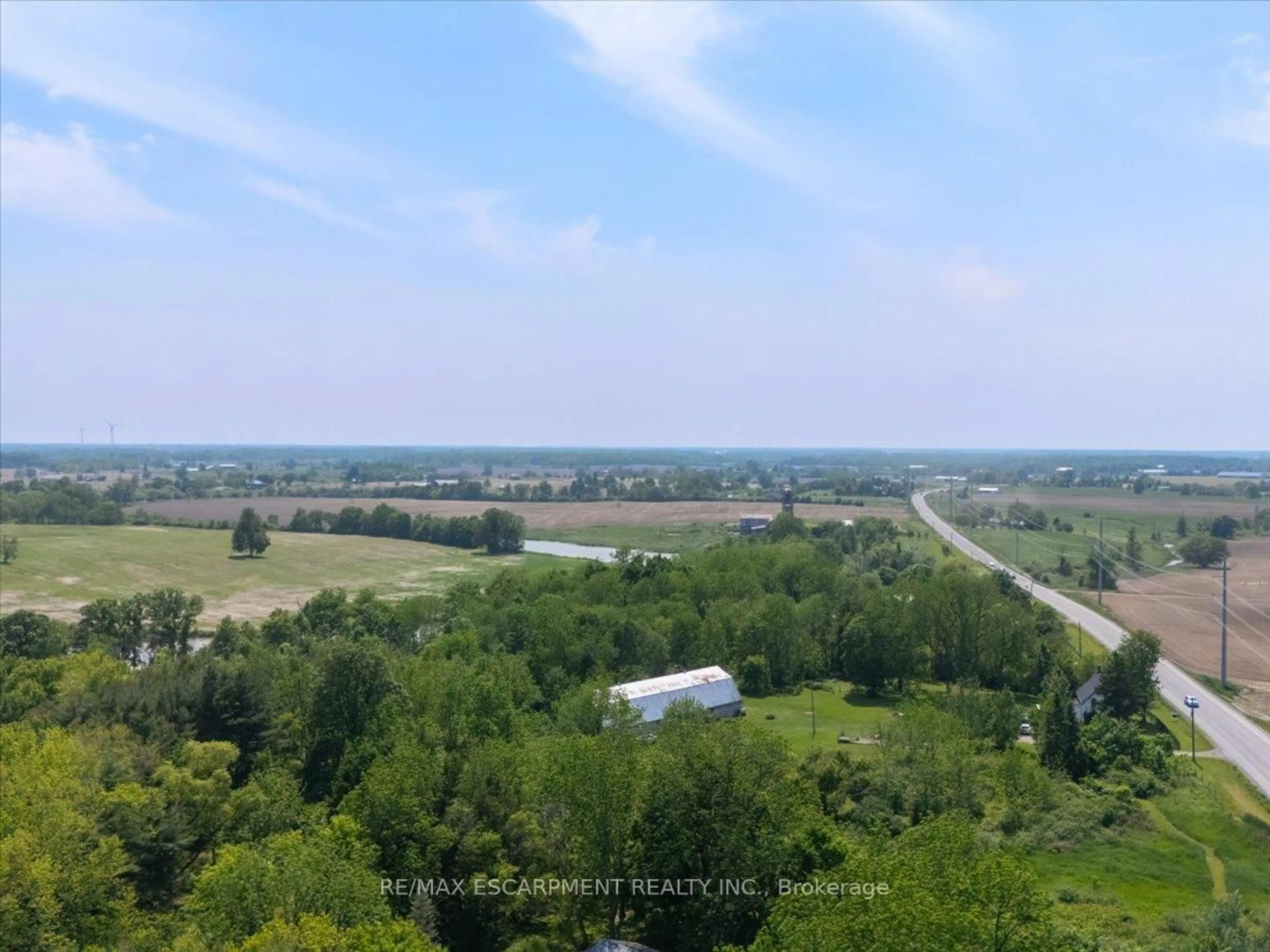 A pic from outside/outdoor area/front of a property/back of a property/a pic from drone, forest/trees view for 5914 Canborough Rd, West Lincoln Ontario L0R 2J0