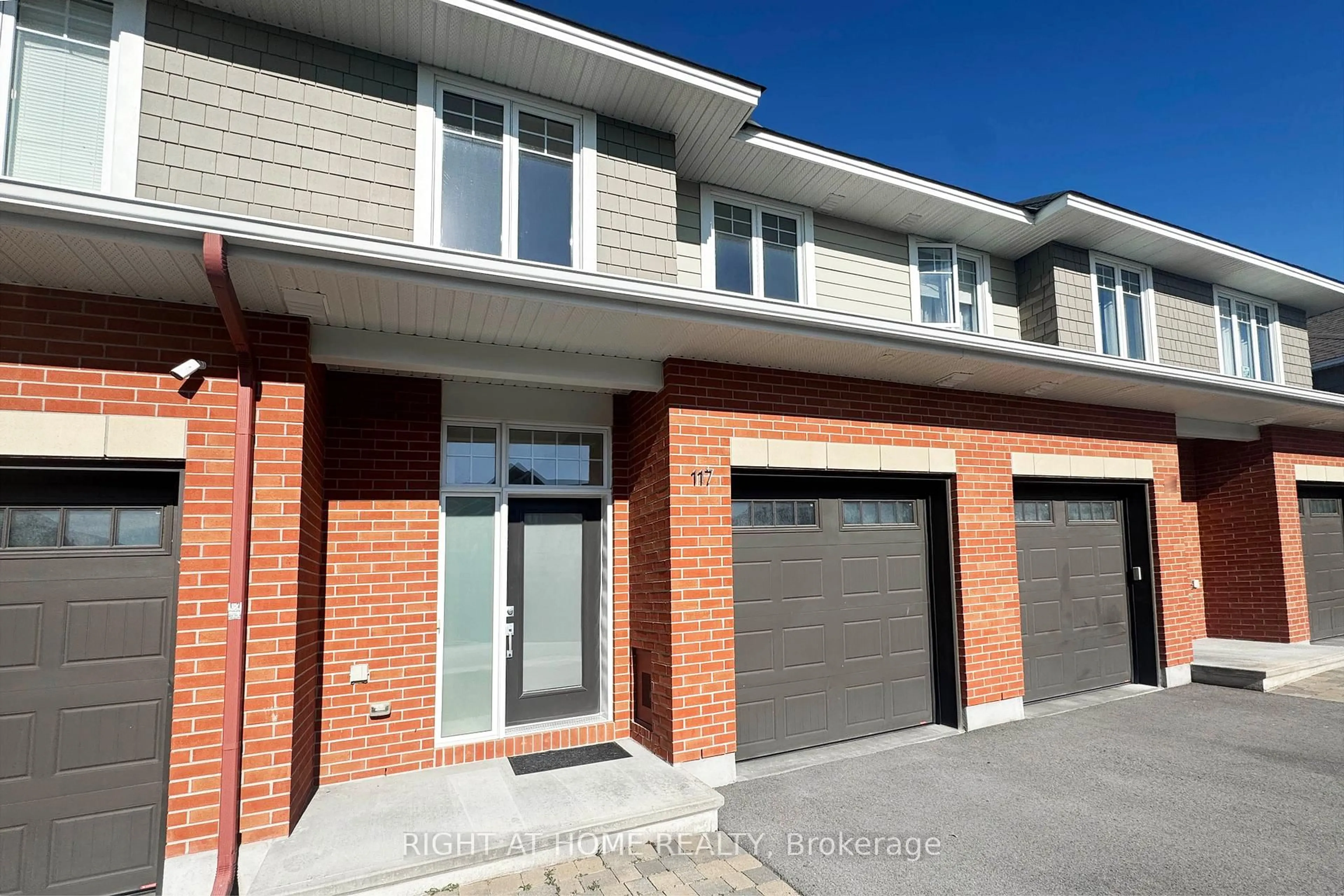 Home with brick exterior material, street for 117 Escarpment Cres, Ottawa Ontario K2T 0L8