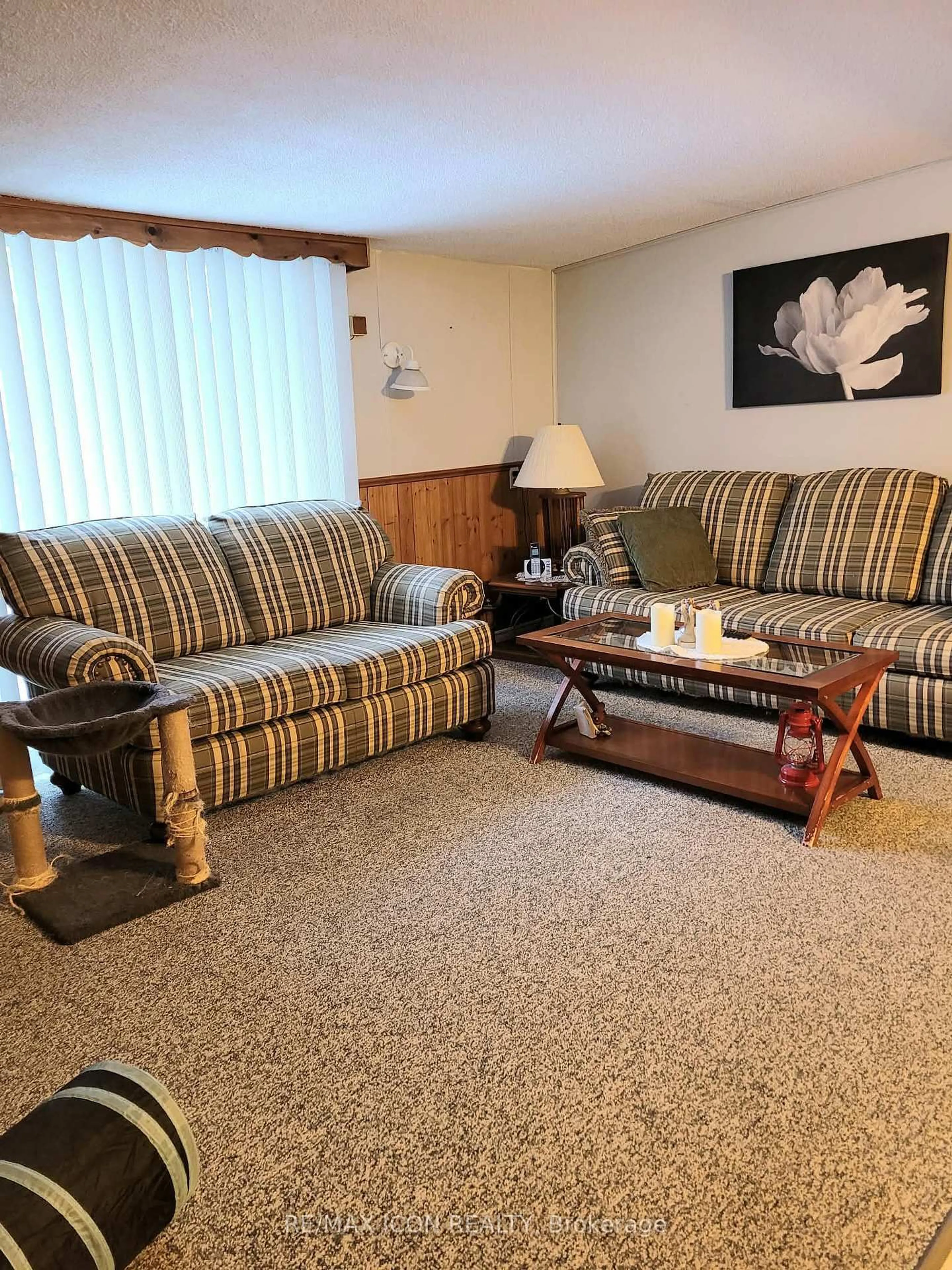 Living room with furniture, carpet floor for 9839 Lakeshore Rd #16, Lambton Shores Ontario N0M 1T0