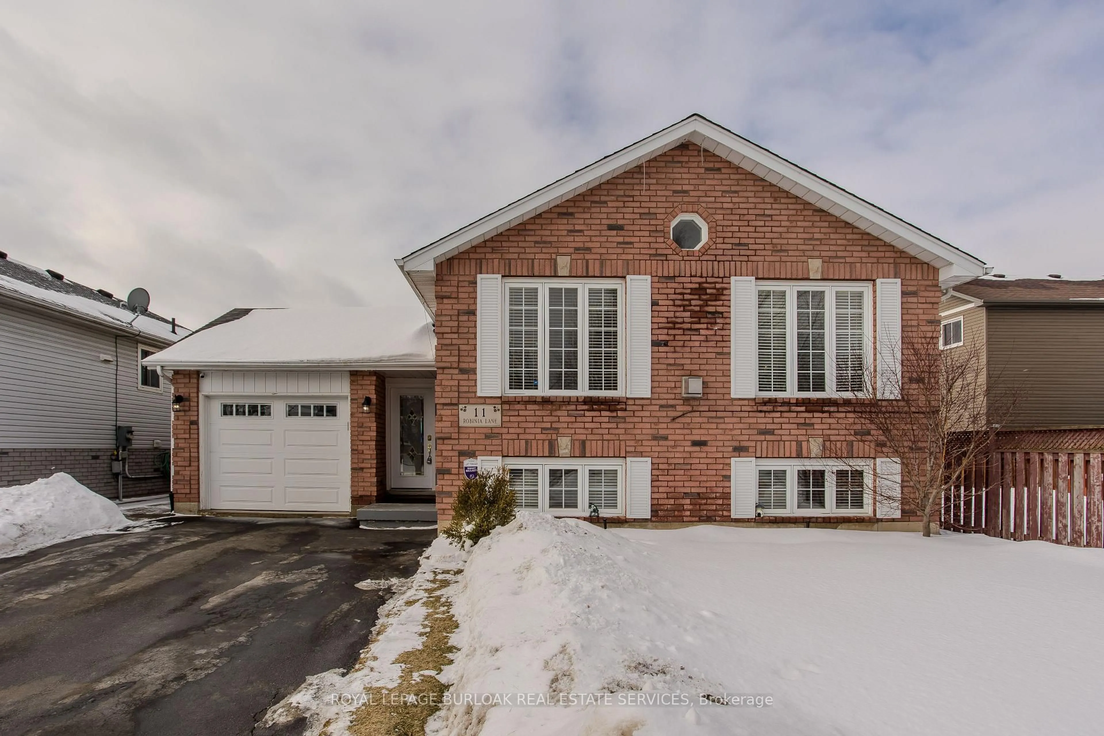 Home with brick exterior material, street for 11 Robinia Lane, Brantford Ontario N3V 1E3