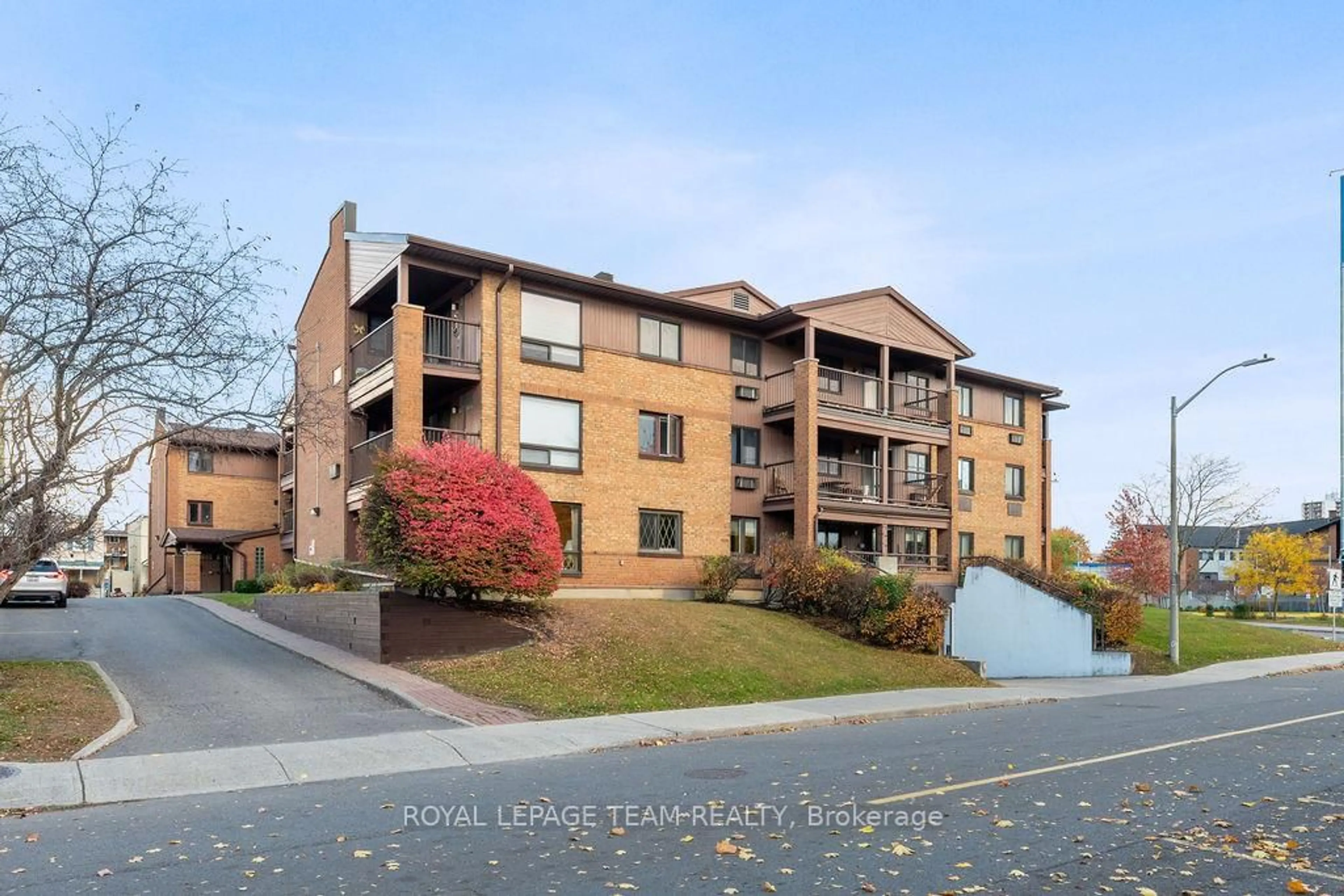 A pic from outside/outdoor area/front of a property/back of a property/a pic from drone, unknown for 316 Savard Ave #212, Ottawa Ontario K1L 7S2