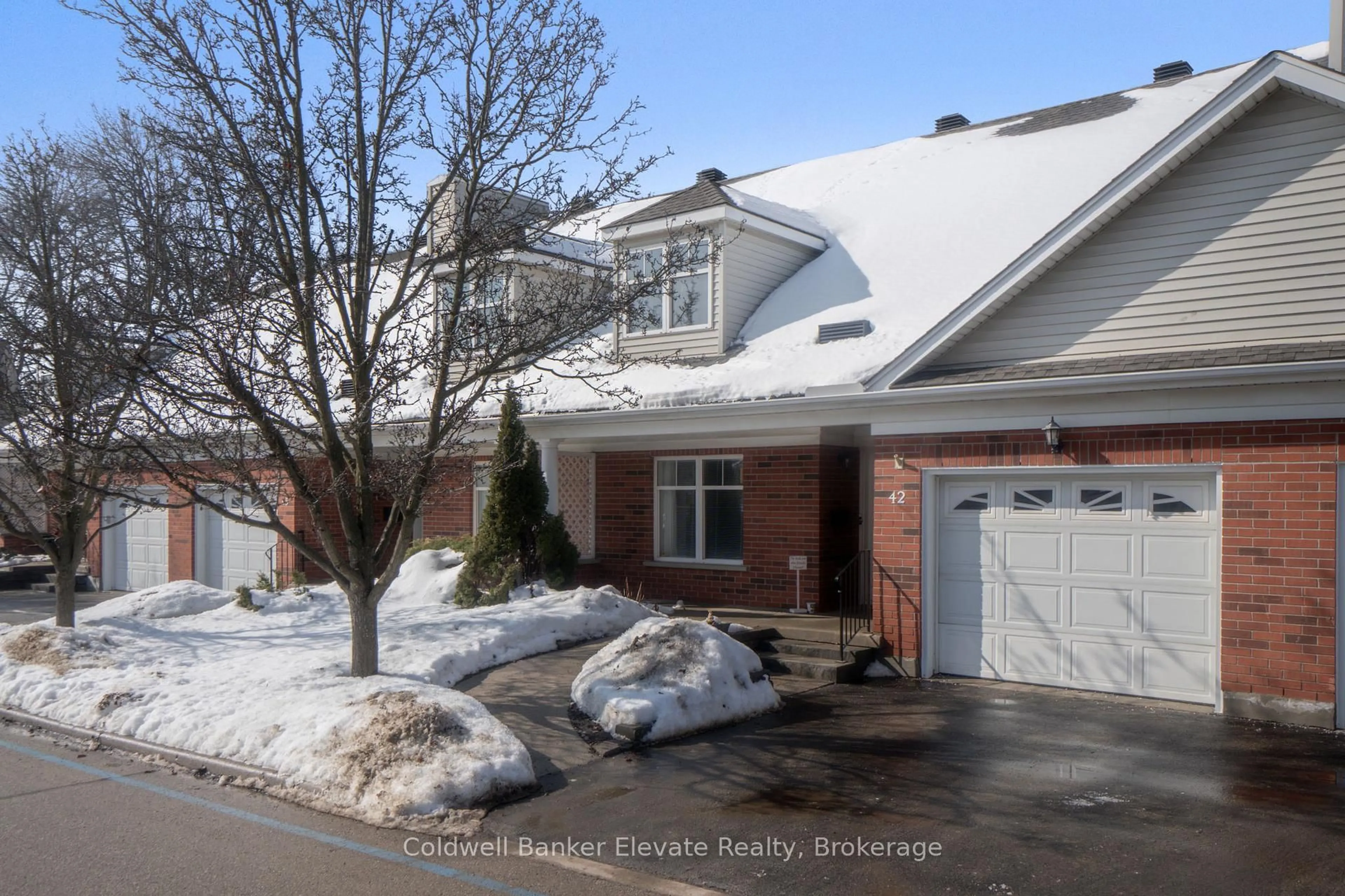 Home with brick exterior material, street for 2705 KINGSWAY Dr #42, Kitchener Ontario N2C 2T2