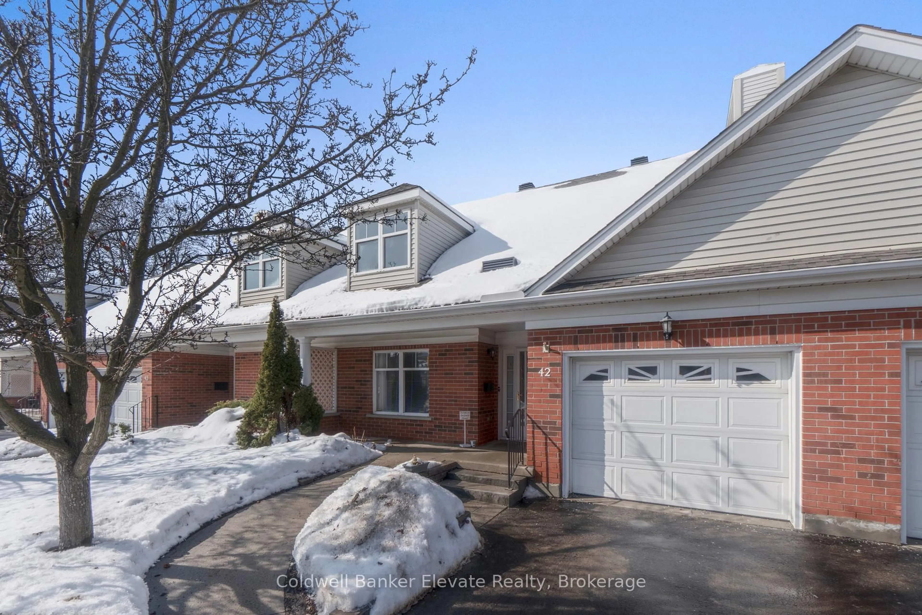 Home with brick exterior material, street for 2705 KINGSWAY Dr #42, Kitchener Ontario N2C 2T2