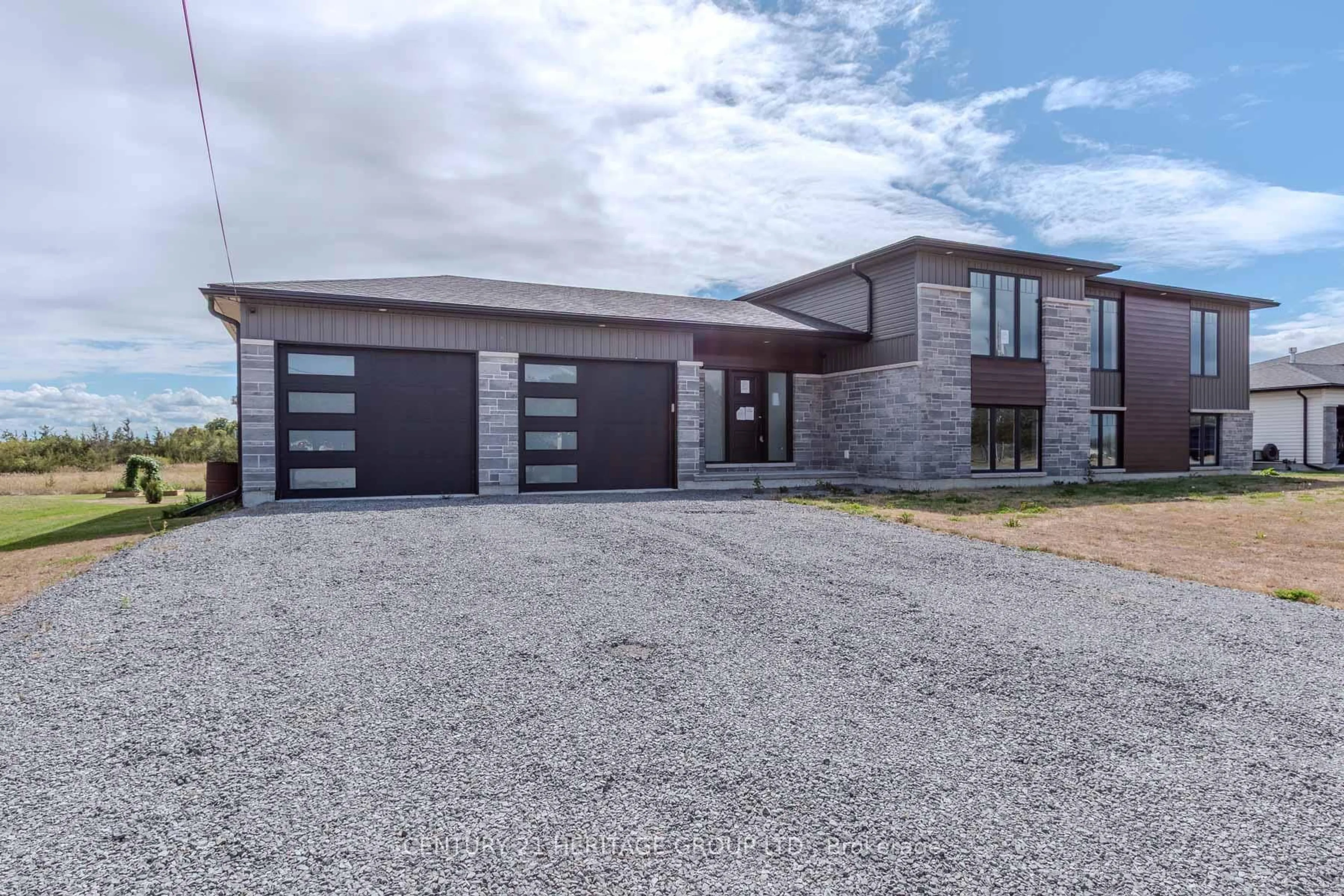 Home with brick exterior material, street for 41 County 29 Rd, Prince Edward County Ontario K0K 1T0