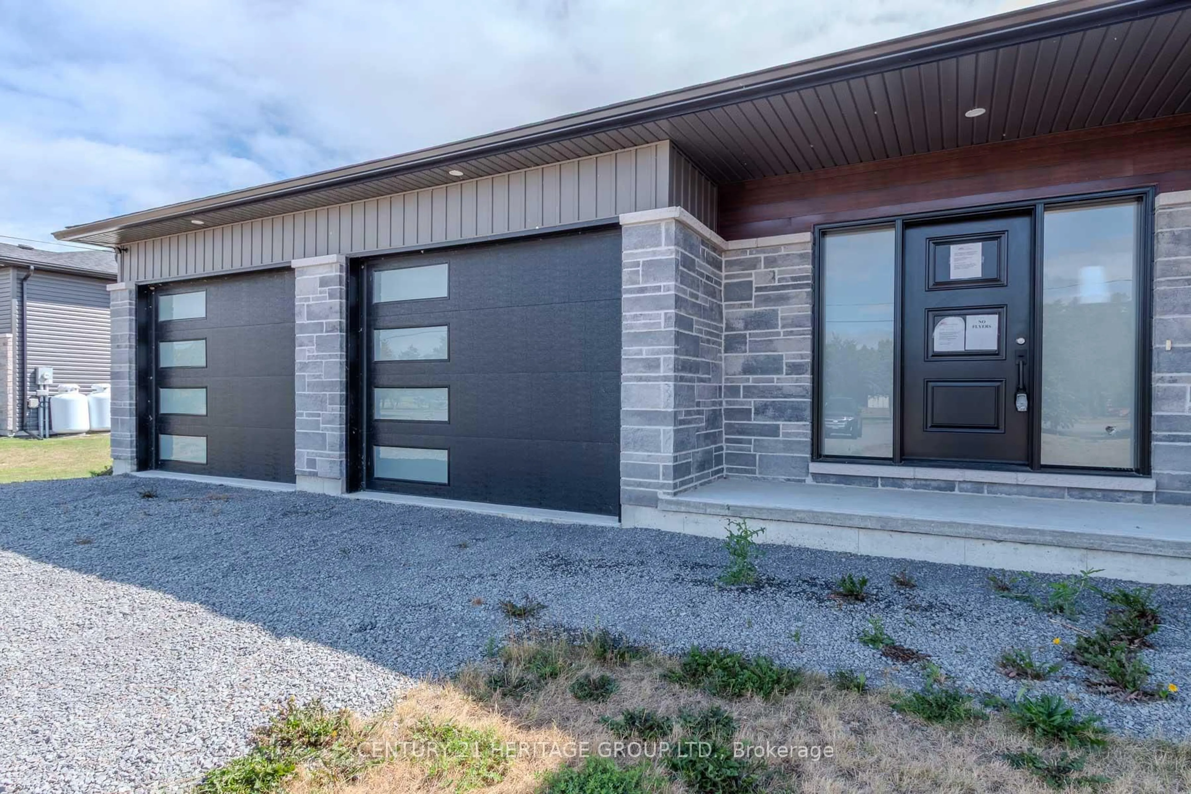 Home with brick exterior material, street for 41 County 29 Rd, Prince Edward County Ontario K0K 1T0