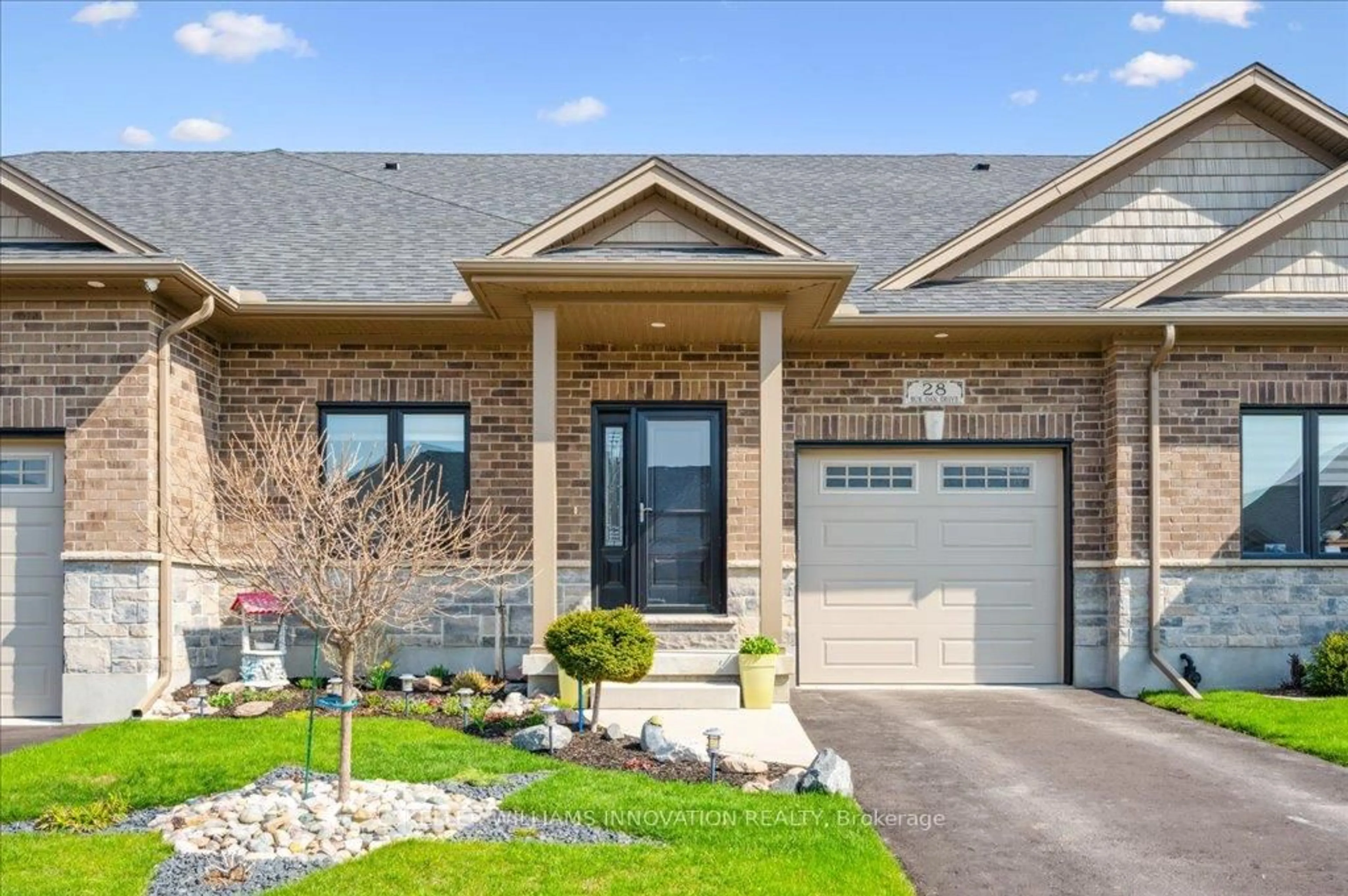 Home with brick exterior material, street for 28 Bur Oak Dr, Woolwich Ontario N3B 0C6