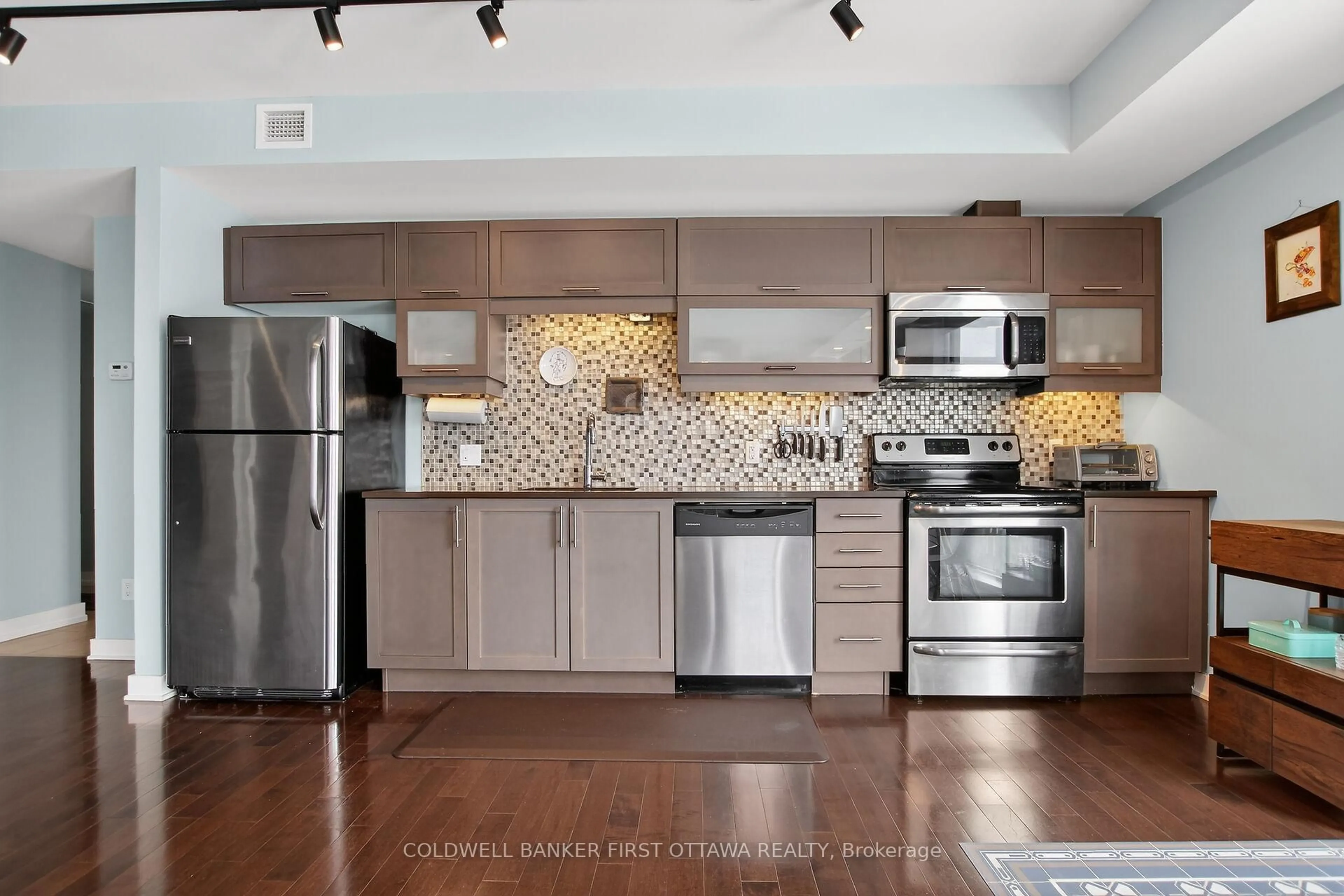 Open concept kitchen, ceramic/tile floor for 179 Metcalfe St #806, Ottawa Ontario K2P 1P7