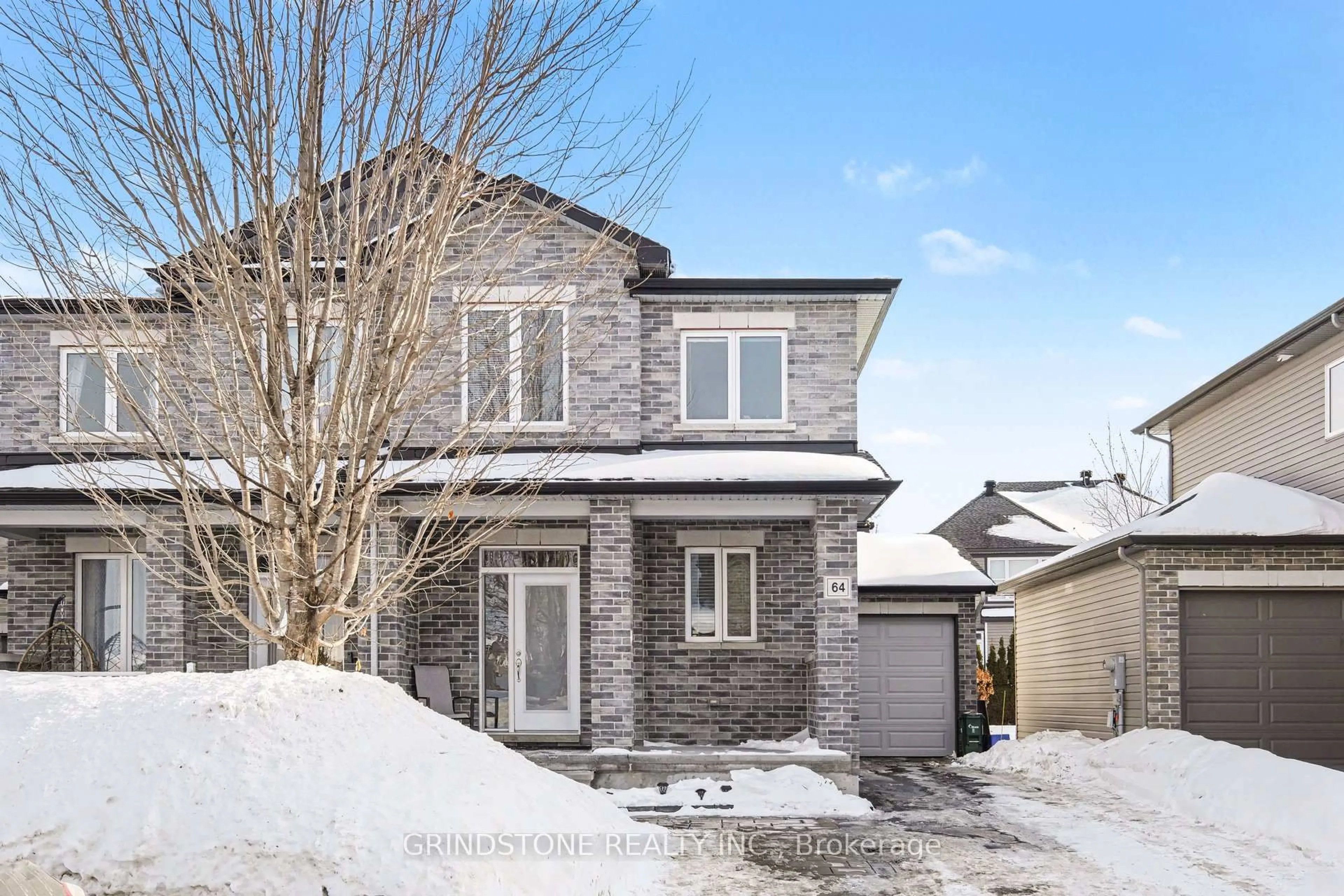 Home with brick exterior material, street for 64 Watershield Rdge, Ottawa Ontario K2J 5A4