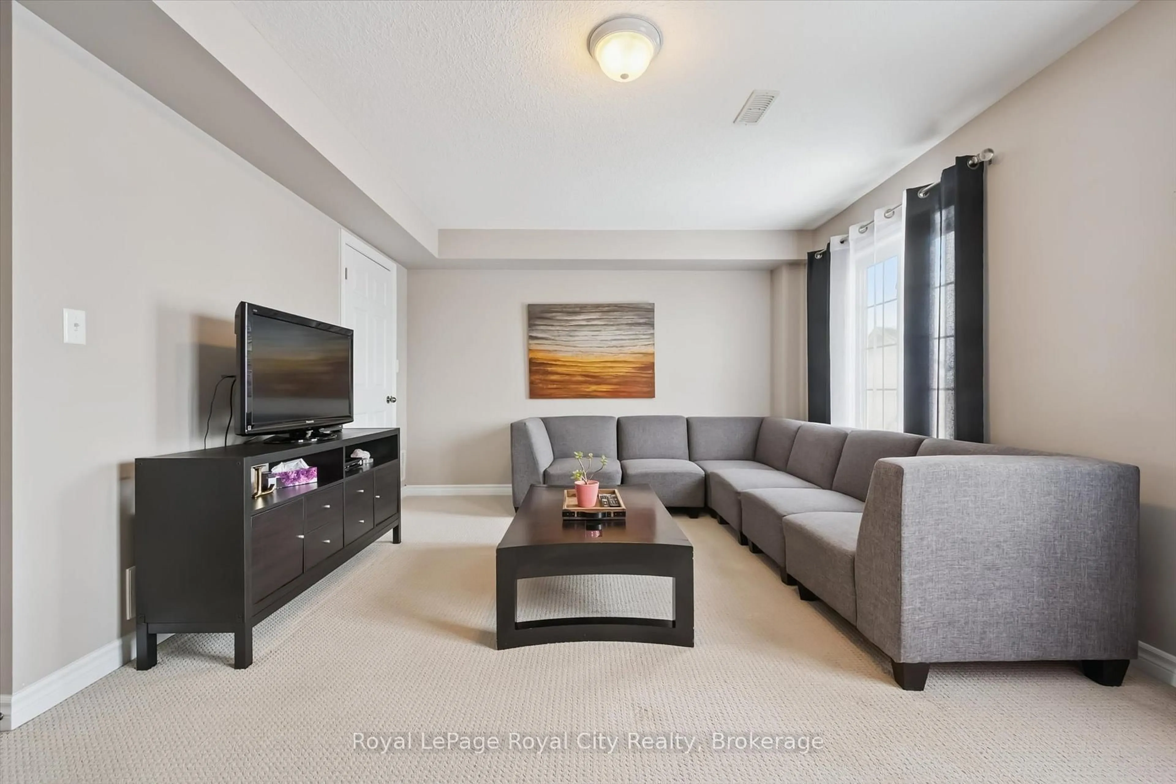 Living room with furniture, unknown for 15 Carere Cres #28B, Guelph Ontario N1E 0K4