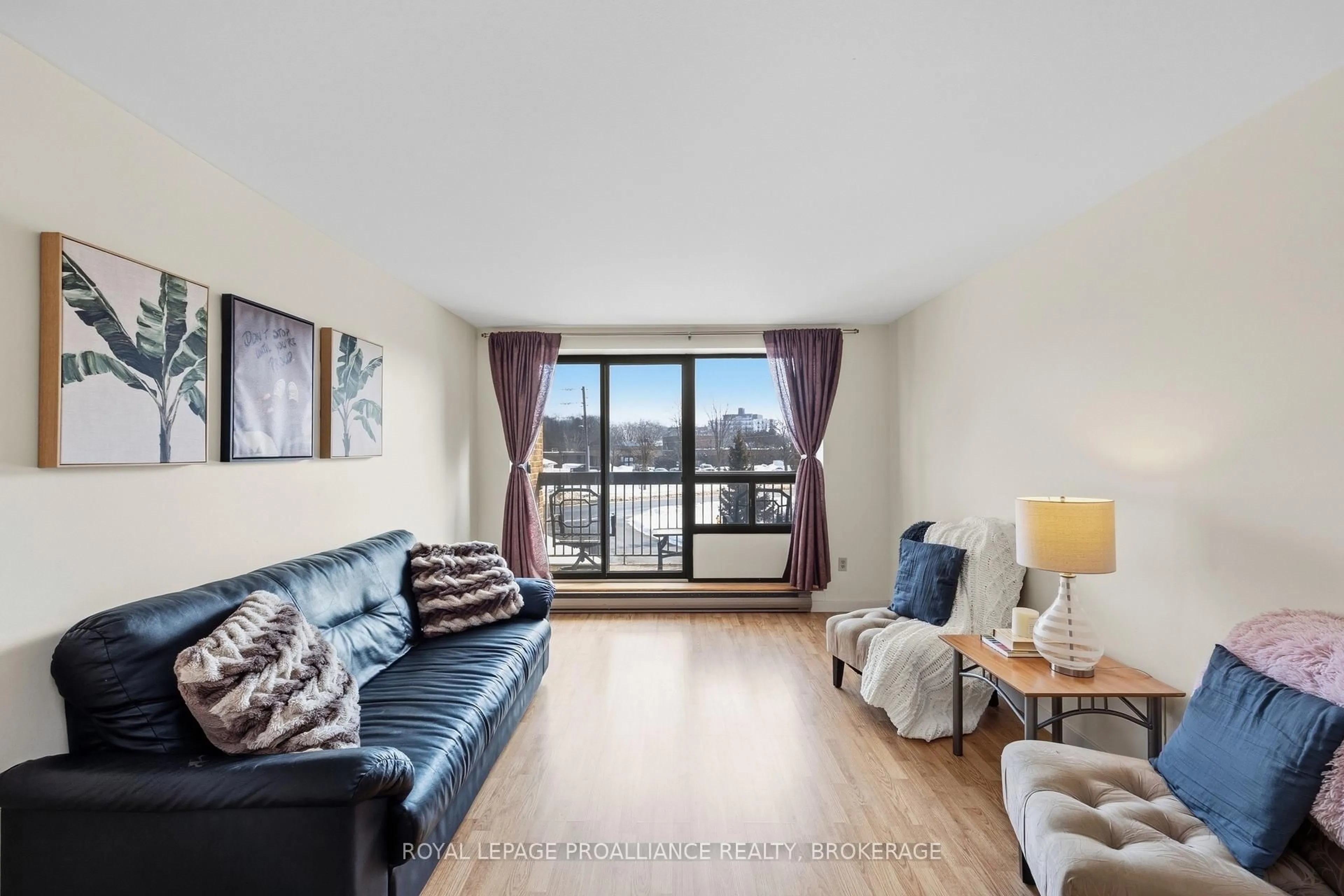 Living room with furniture, unknown for 334 Queen Mary Rd #207, Kingston Ontario K7M 7E7