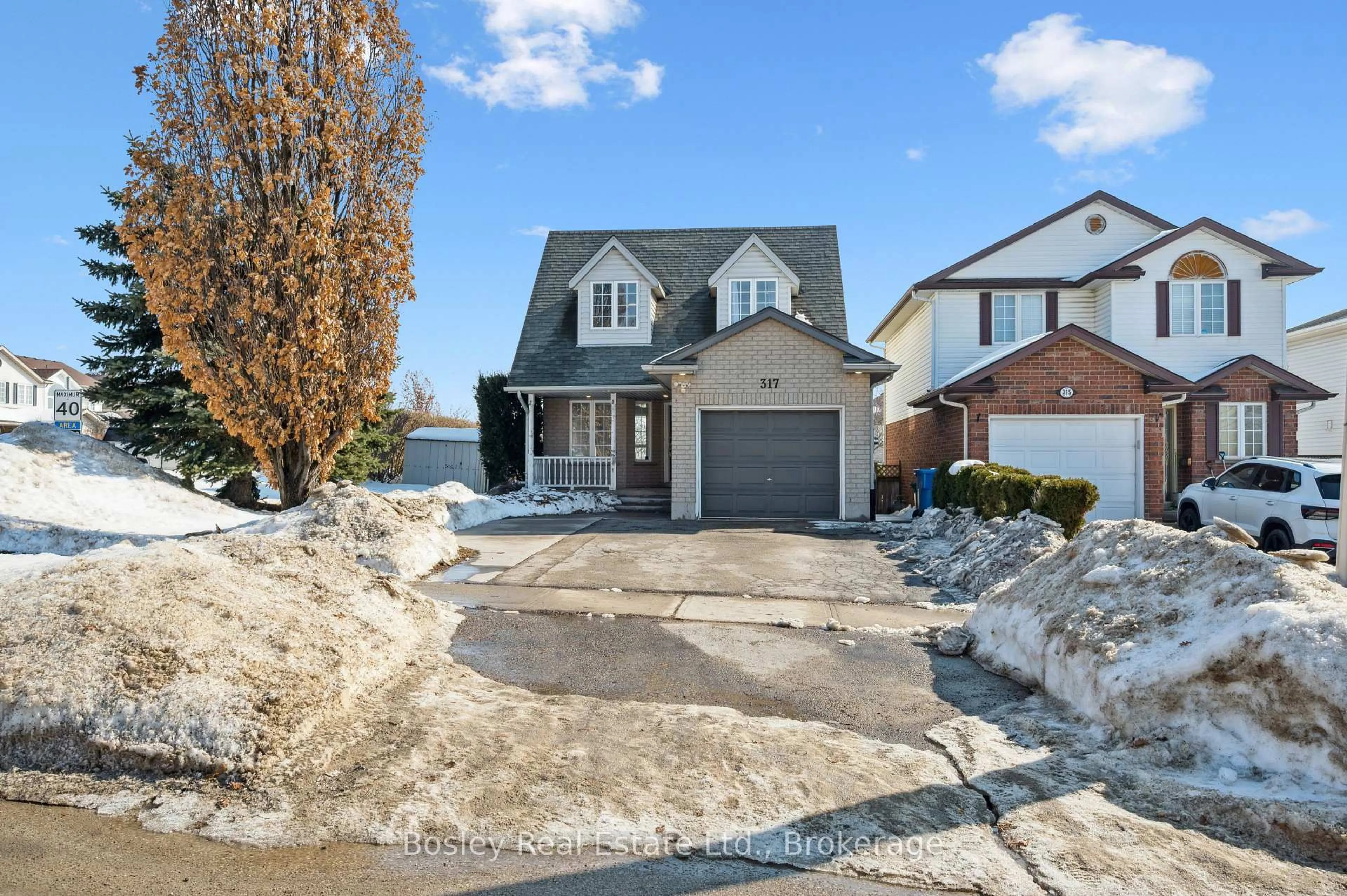 Home with brick exterior material, street for 317 Grange Rd, Guelph Ontario N1E 7B5