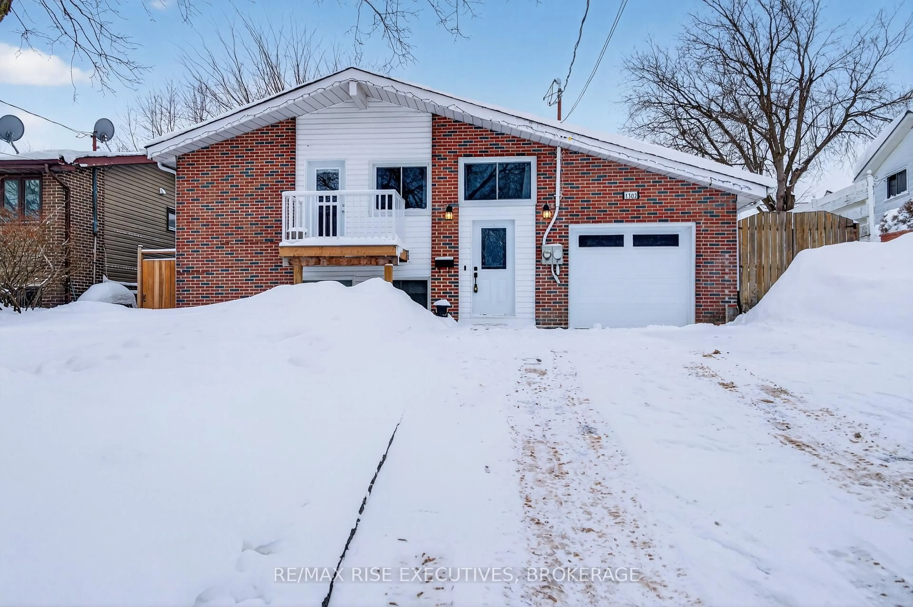 Home with brick exterior material, street for 1302 Montreal St, Kingston Ontario K7K 3L6