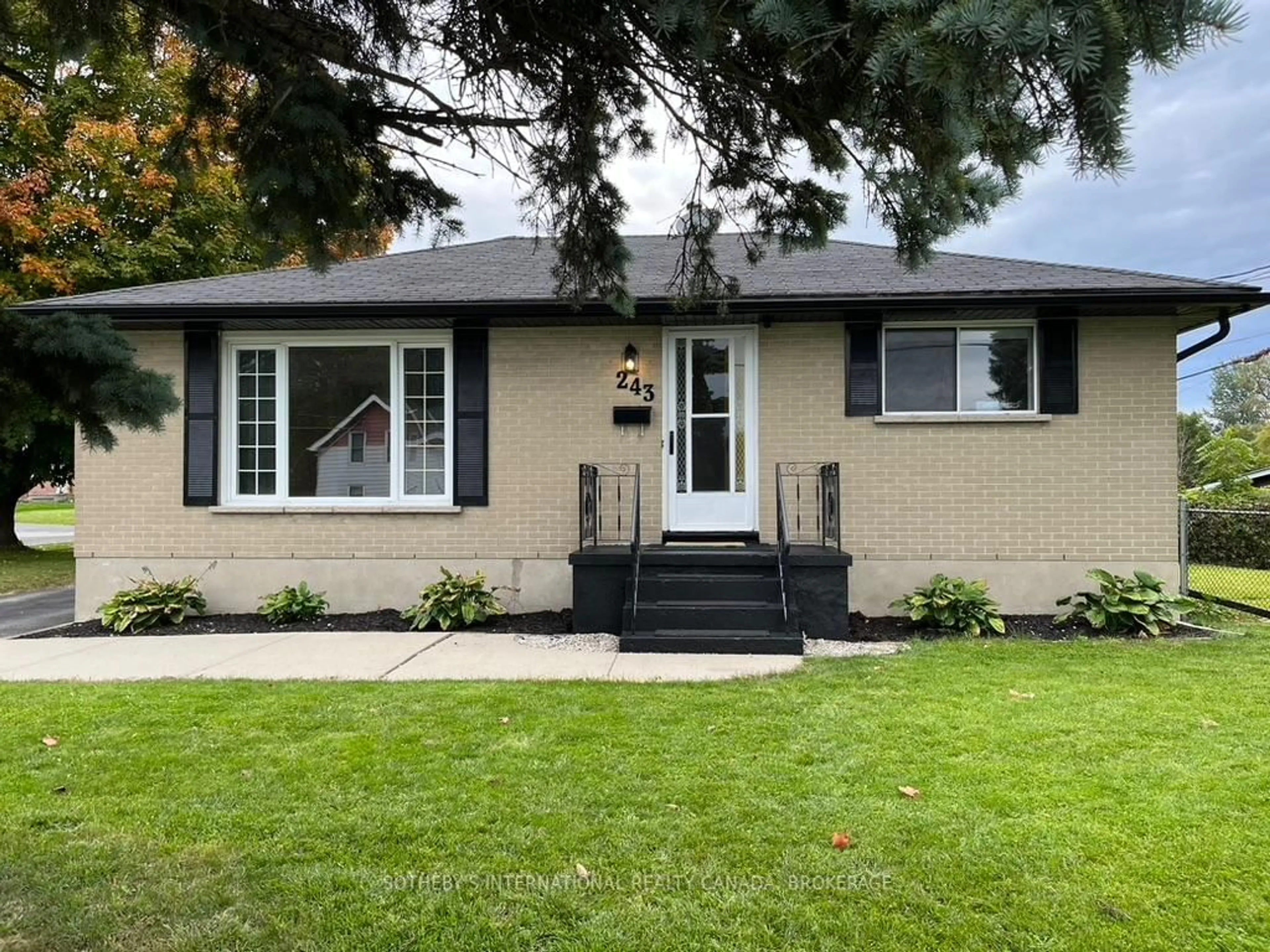 Home with vinyl exterior material, street for 243 Bartholomew St, Brockville Ontario K6V 2S4