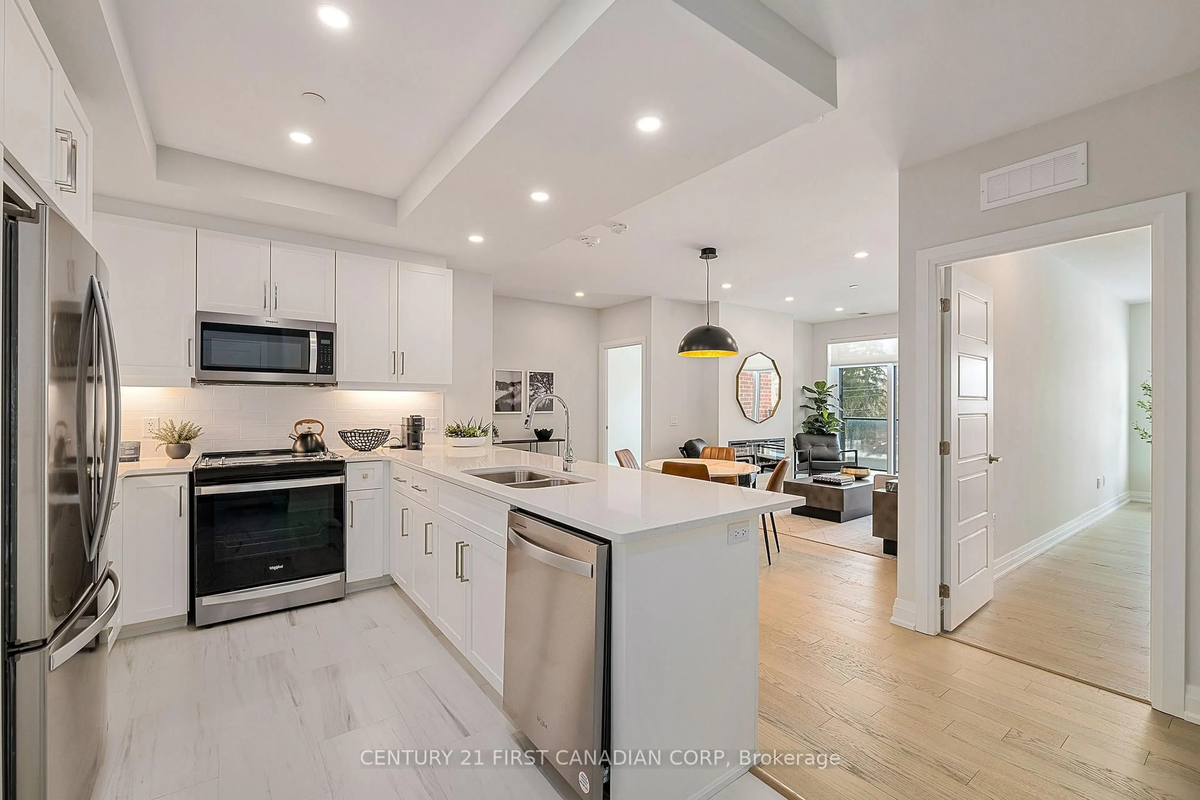 Open concept kitchen, ceramic/tile floor for 1975 FOUNTAIN GRASS Dr #106, London South Ontario N6K 4P9