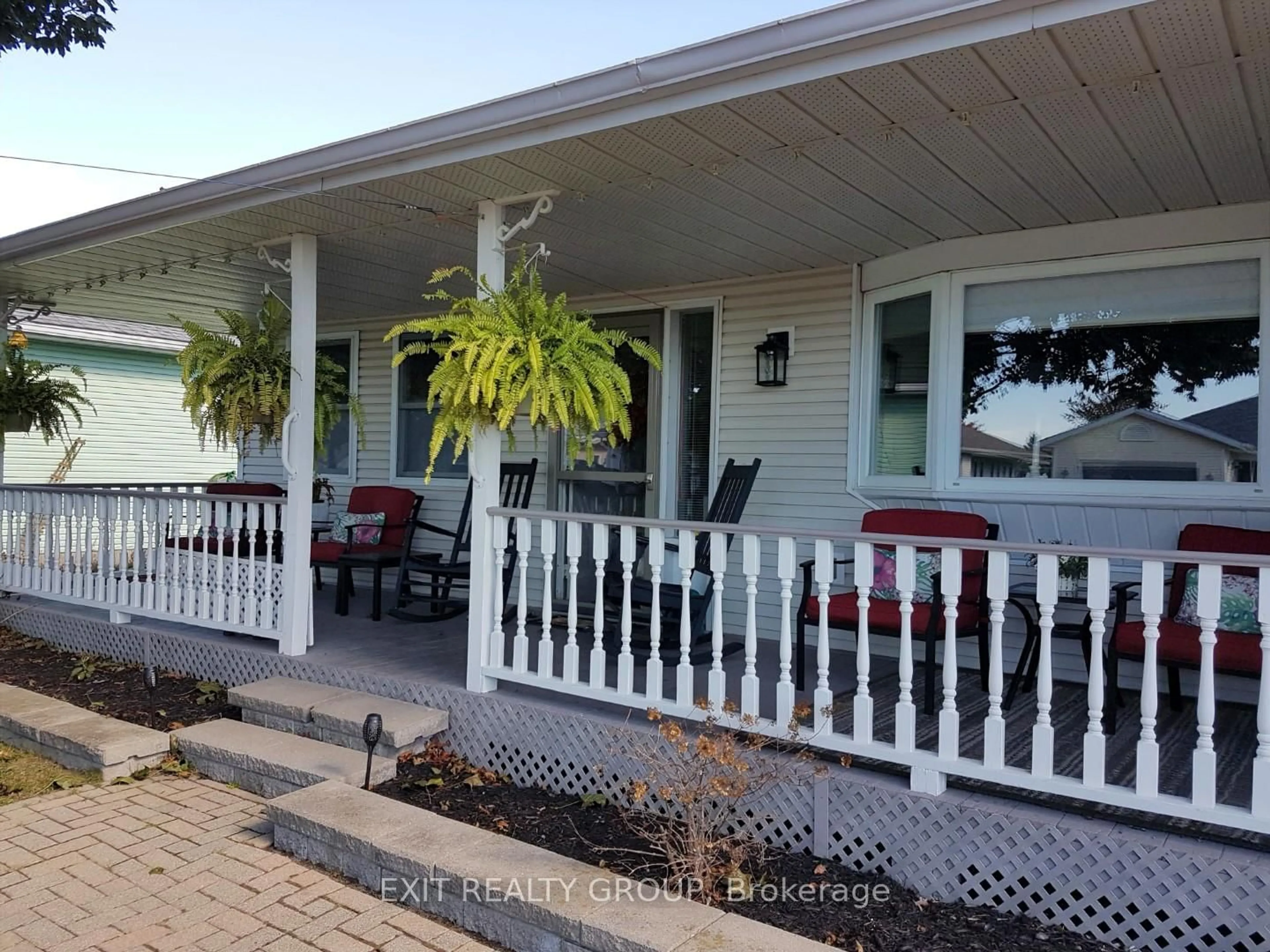 Home with vinyl exterior material, street for 1 Quaker Crt, Prince Edward County Ontario K0K 3L0