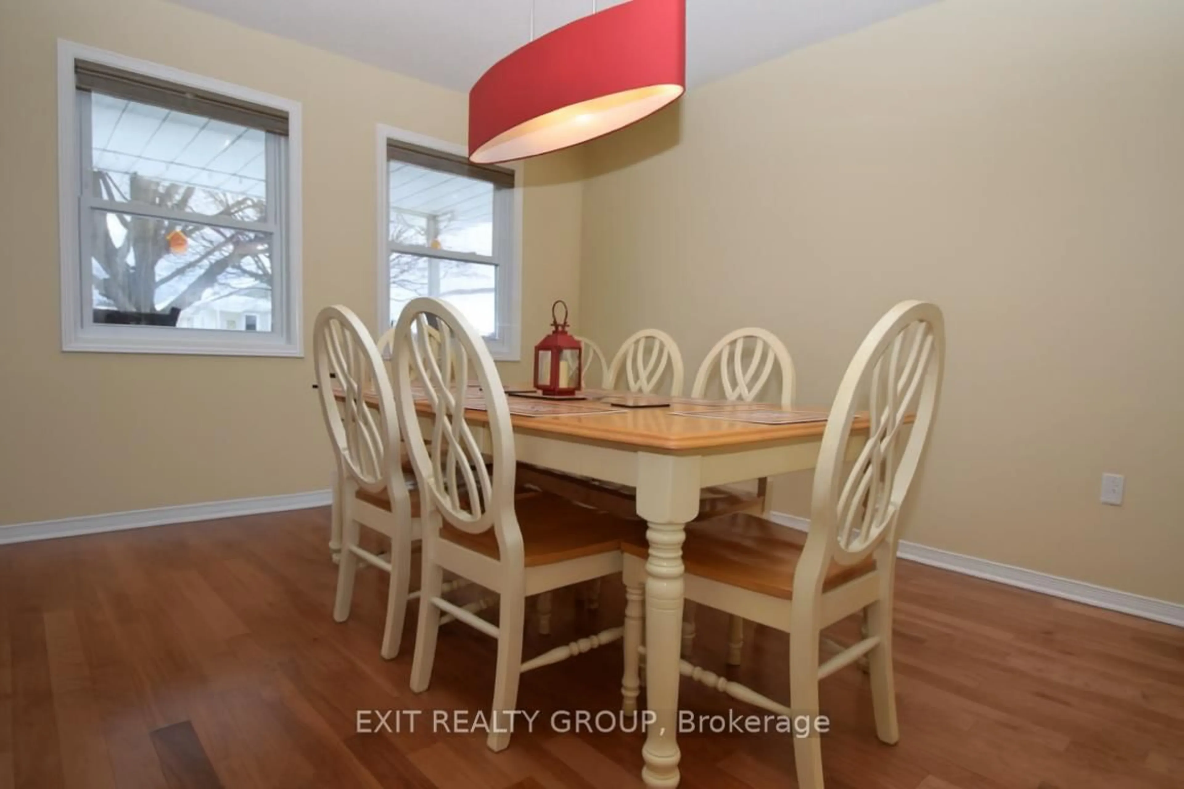 Dining room, wood/laminate floor for 1 Quaker Crt, Prince Edward County Ontario K0K 3L0