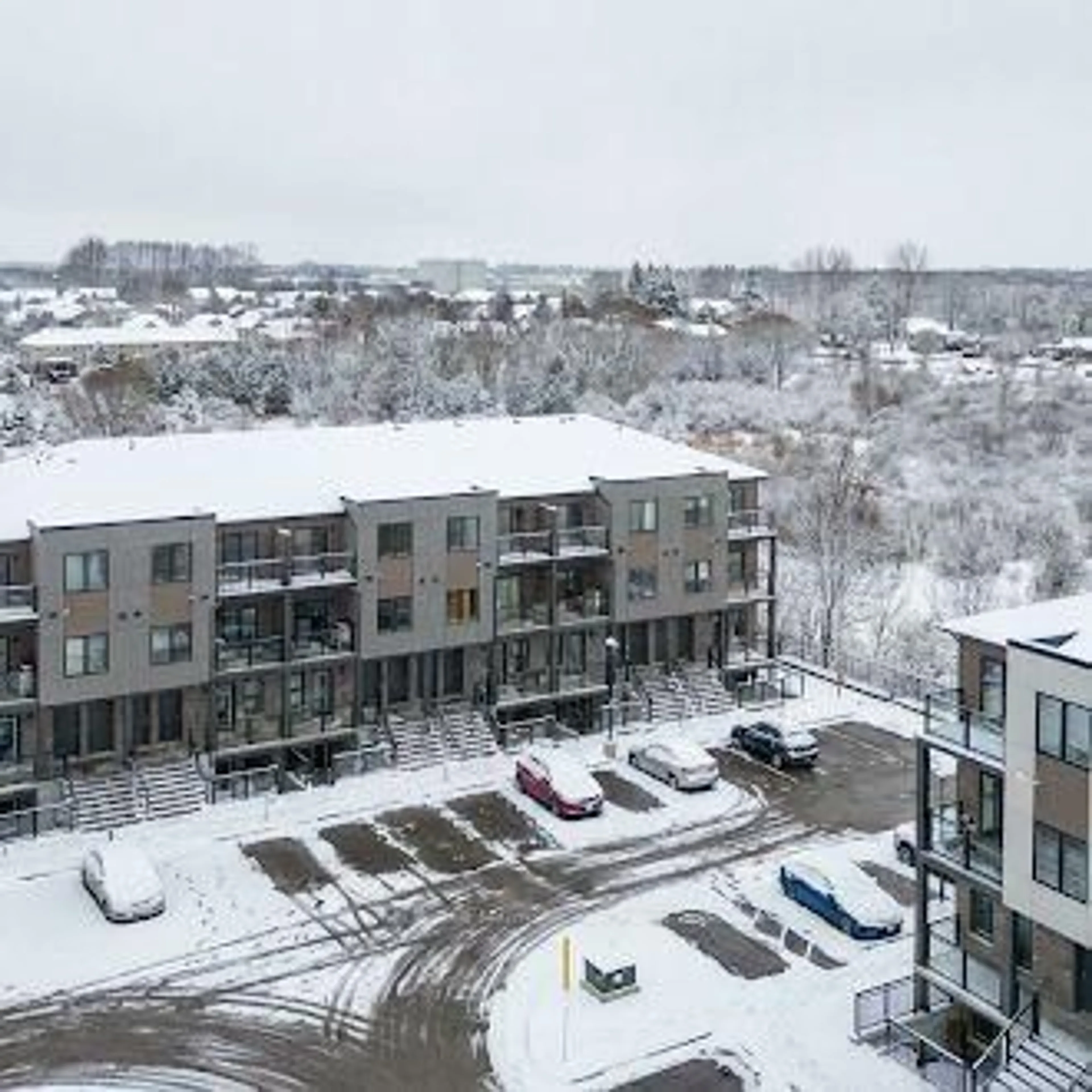 A pic from outside/outdoor area/front of a property/back of a property/a pic from drone, city buildings view from balcony for 940 St David St #51, Centre Wellington Ontario N1M 0L7