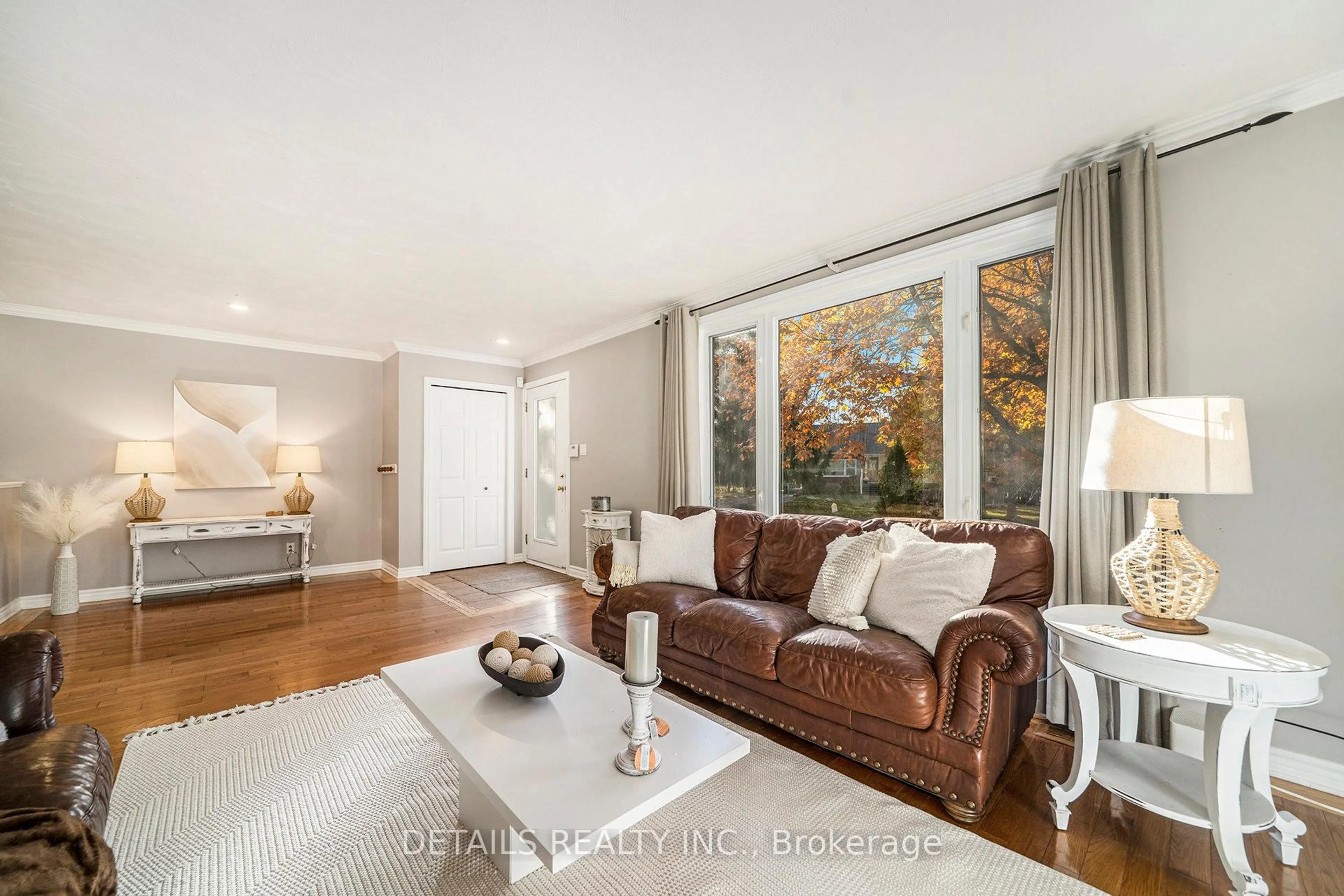 Living room with furniture, wood/laminate floor for 2298 James Craig St, North Gower Ontario K0A 2T0