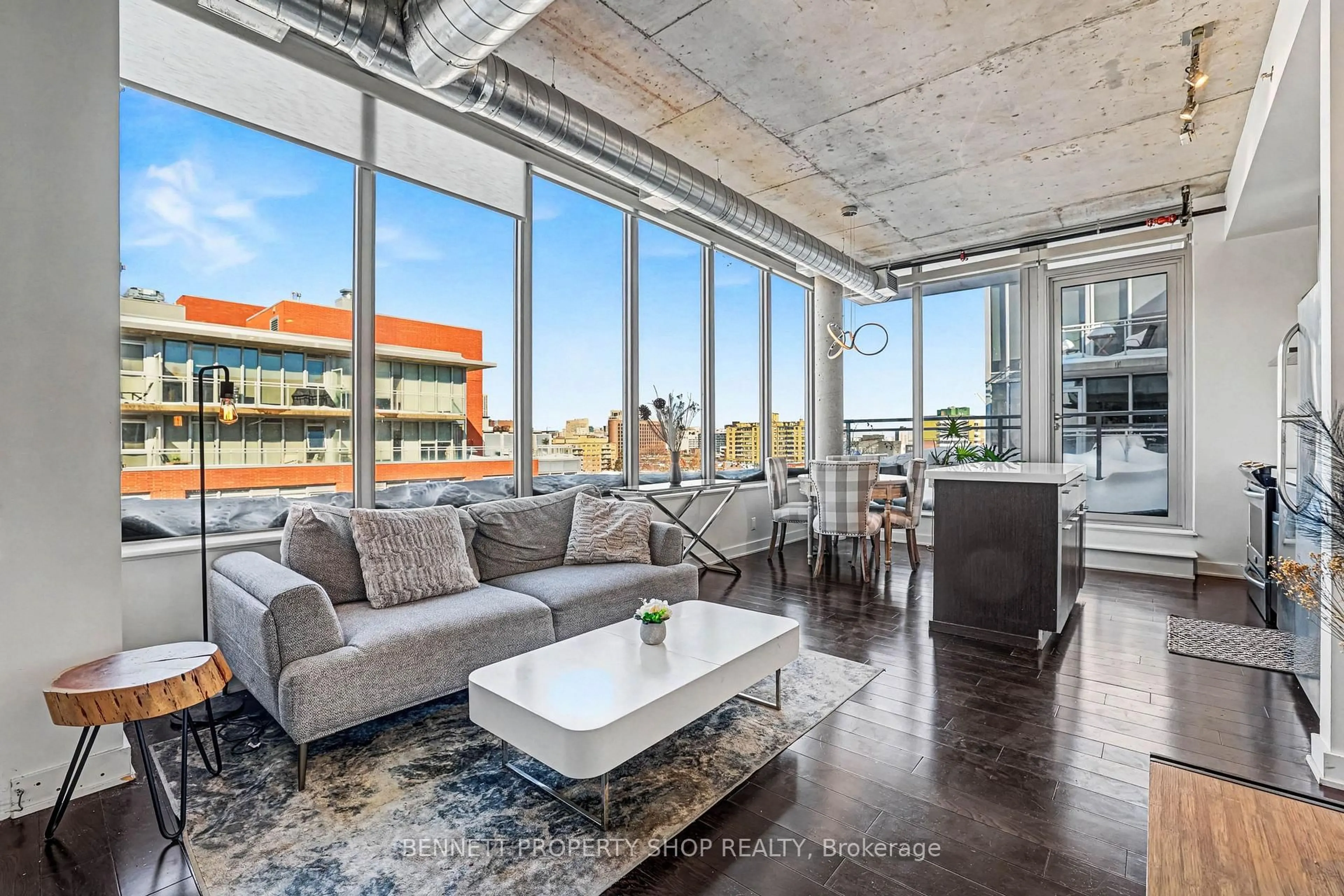 Living room with furniture, cement floor for 360 McLeod St #811, Ottawa Ontario K2P 1A9