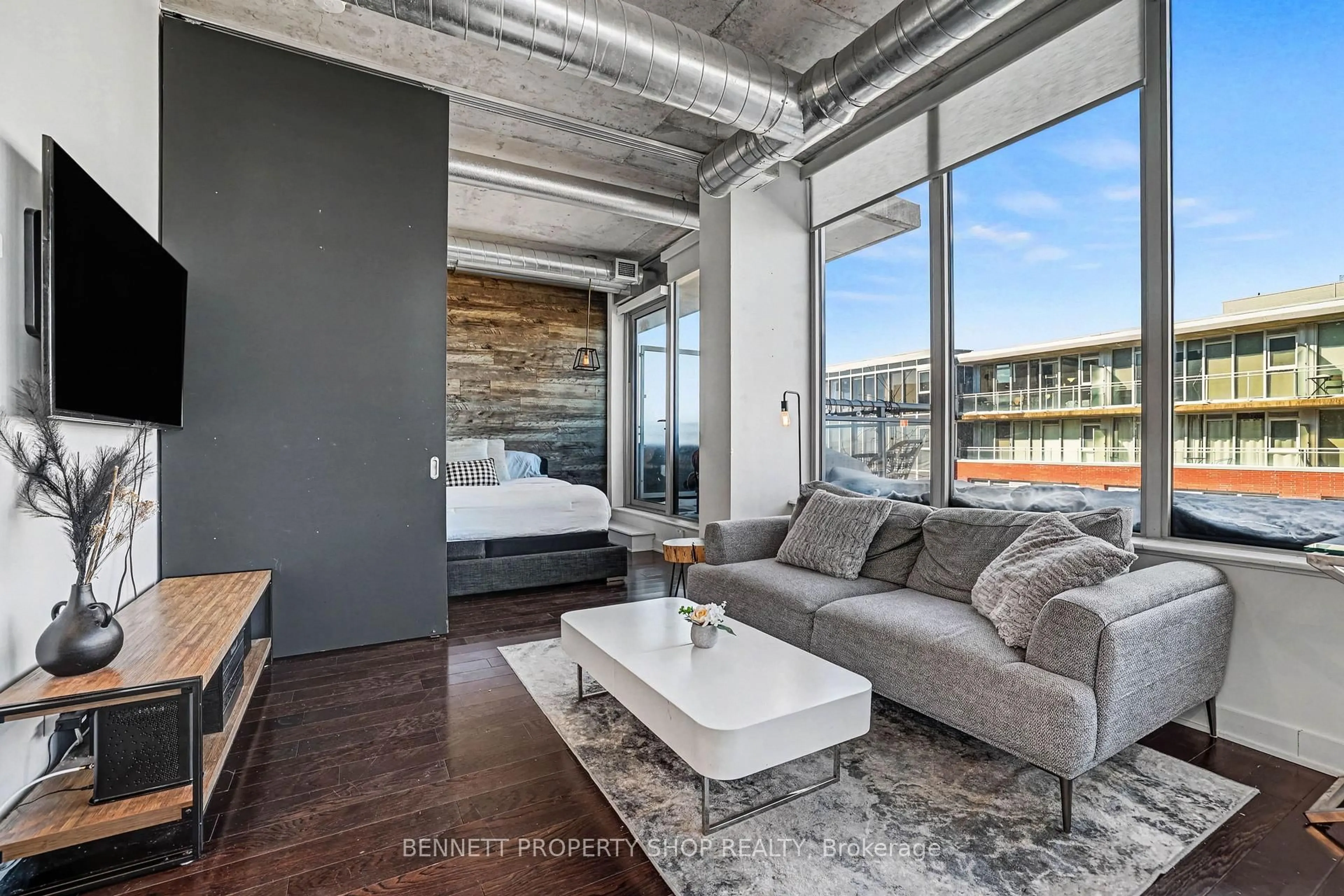 Living room with furniture, cement floor for 360 McLeod St #811, Ottawa Ontario K2P 1A9