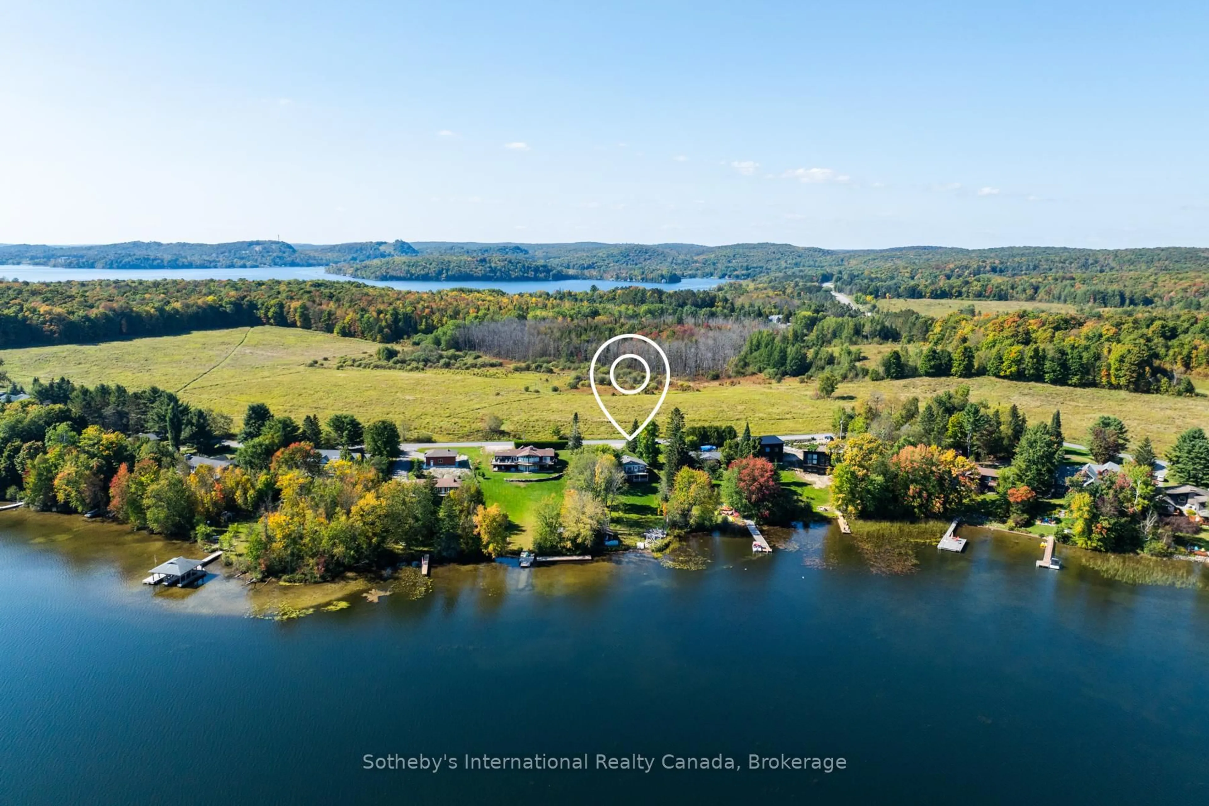 A pic from outside/outdoor area/front of a property/back of a property/a pic from drone, water/lake/river/ocean view for 1111 Maplehurst Dr, Lake of Bays Ontario P1H 2J6