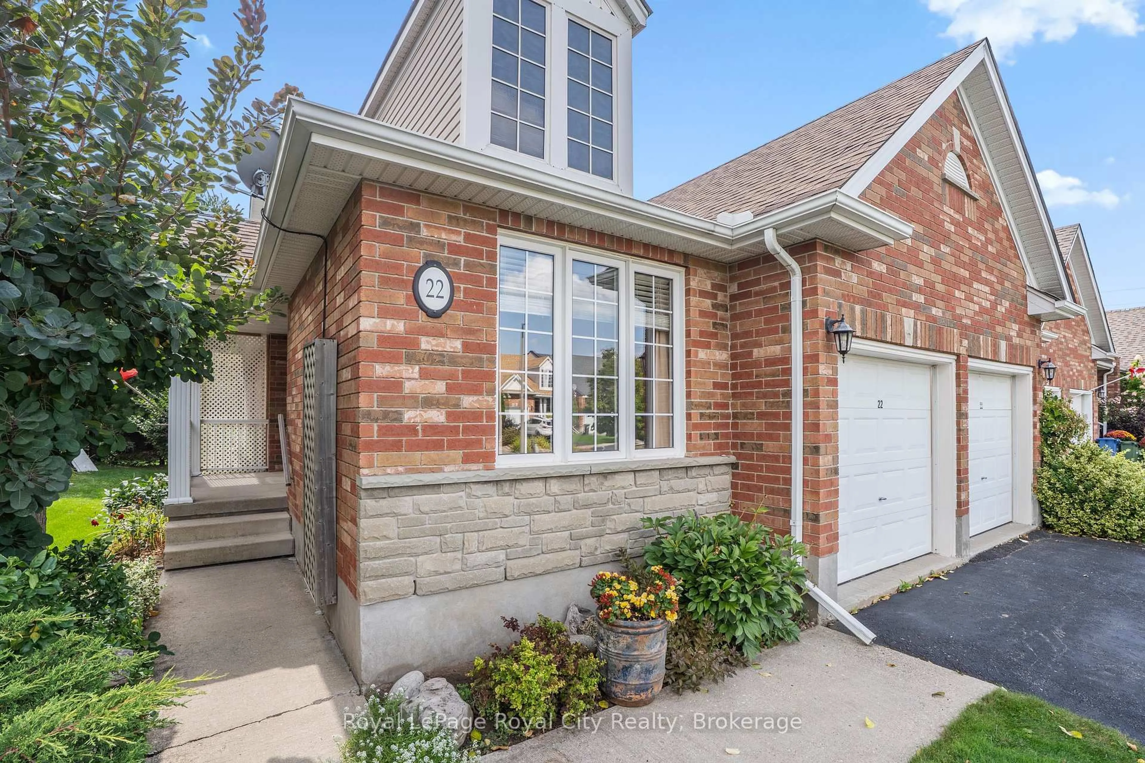 Home with brick exterior material, street for 22 Thornton St, Guelph Ontario N1E 7B1