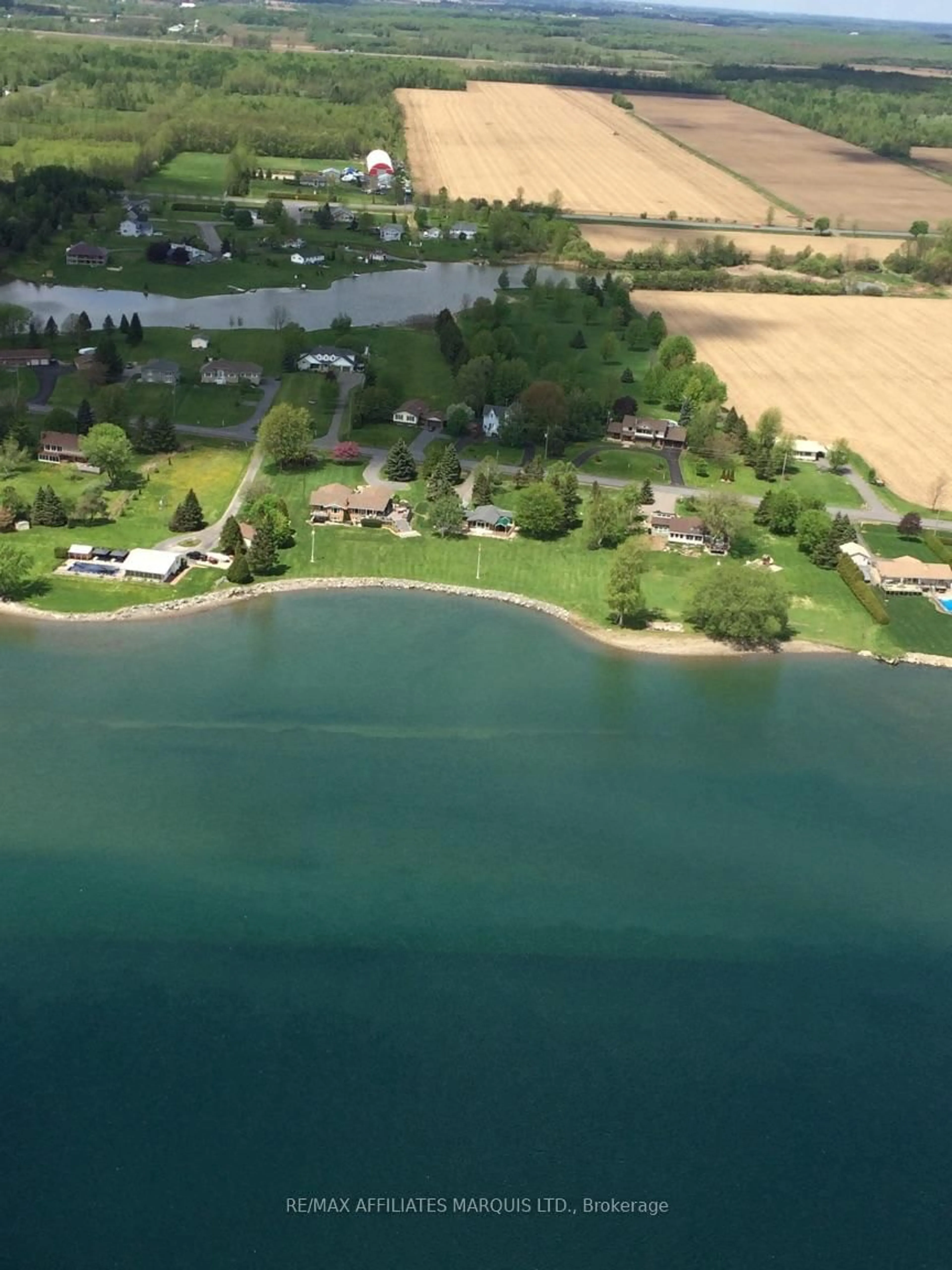 A pic from outside/outdoor area/front of a property/back of a property/a pic from drone, water/lake/river/ocean view for 11728 Lakeshore Dr, South Dundas Ontario K0C 1X0